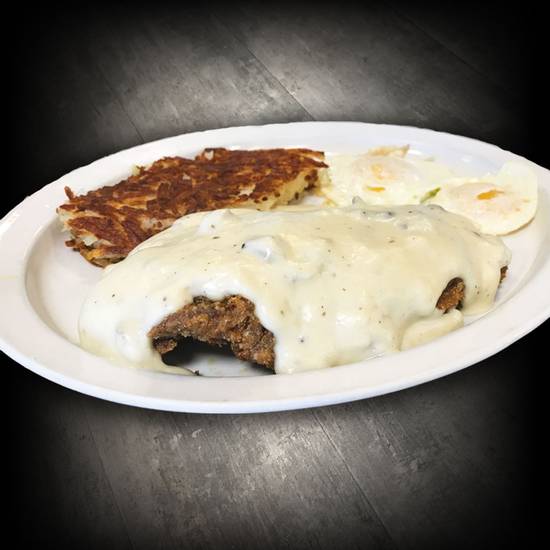 Order Country Fried Steak and Eggs food online from Rusty's Restaurant store, Lake Havasu City on bringmethat.com
