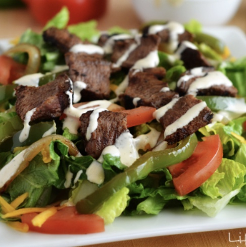 Order Steak Salad food online from Wing It! Bar And Grill store, El Paso on bringmethat.com