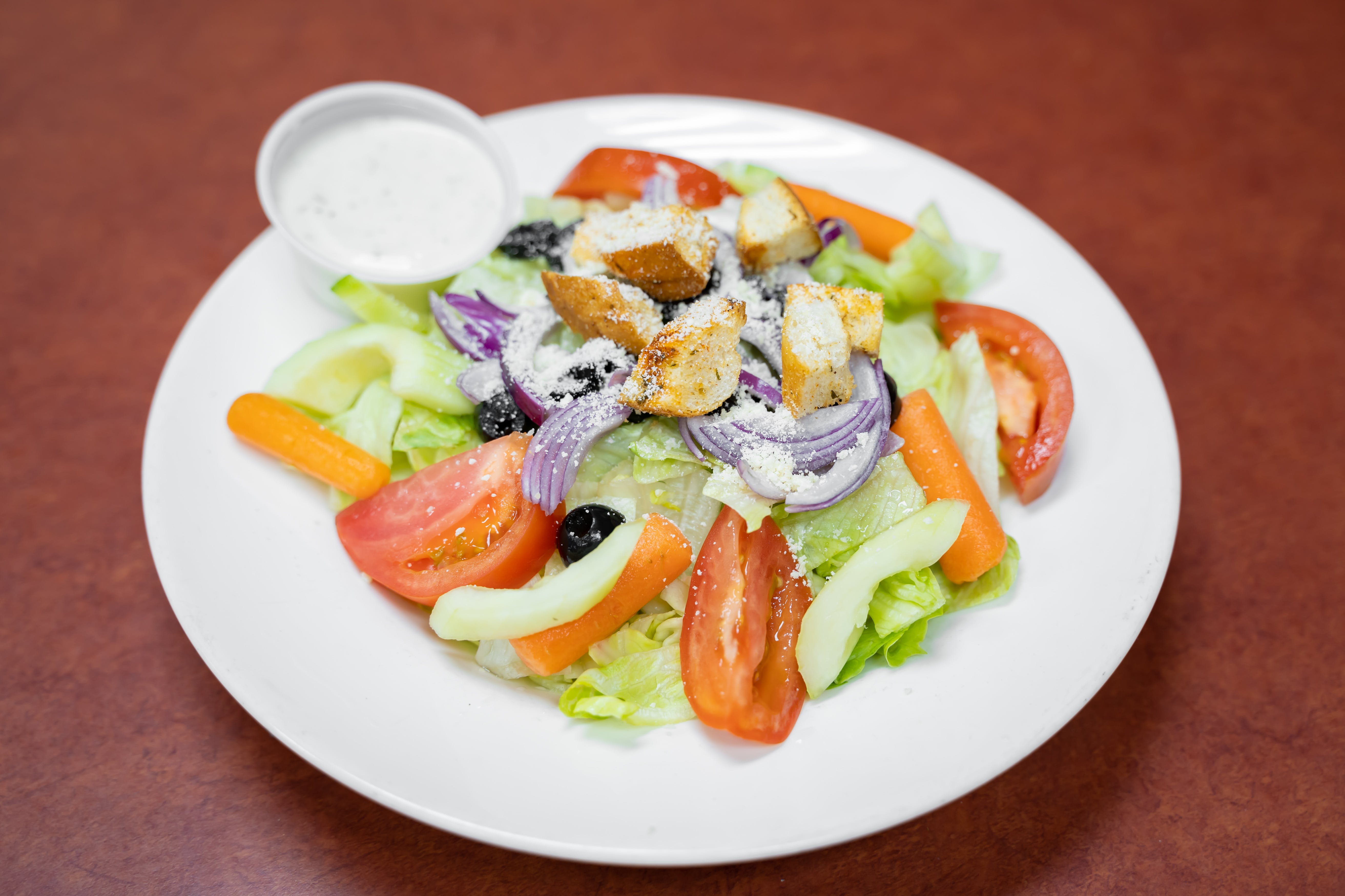 Order Soprano’s Tossed Salad - Small food online from Tony Sopranos Pizza store, Cherry Hill on bringmethat.com