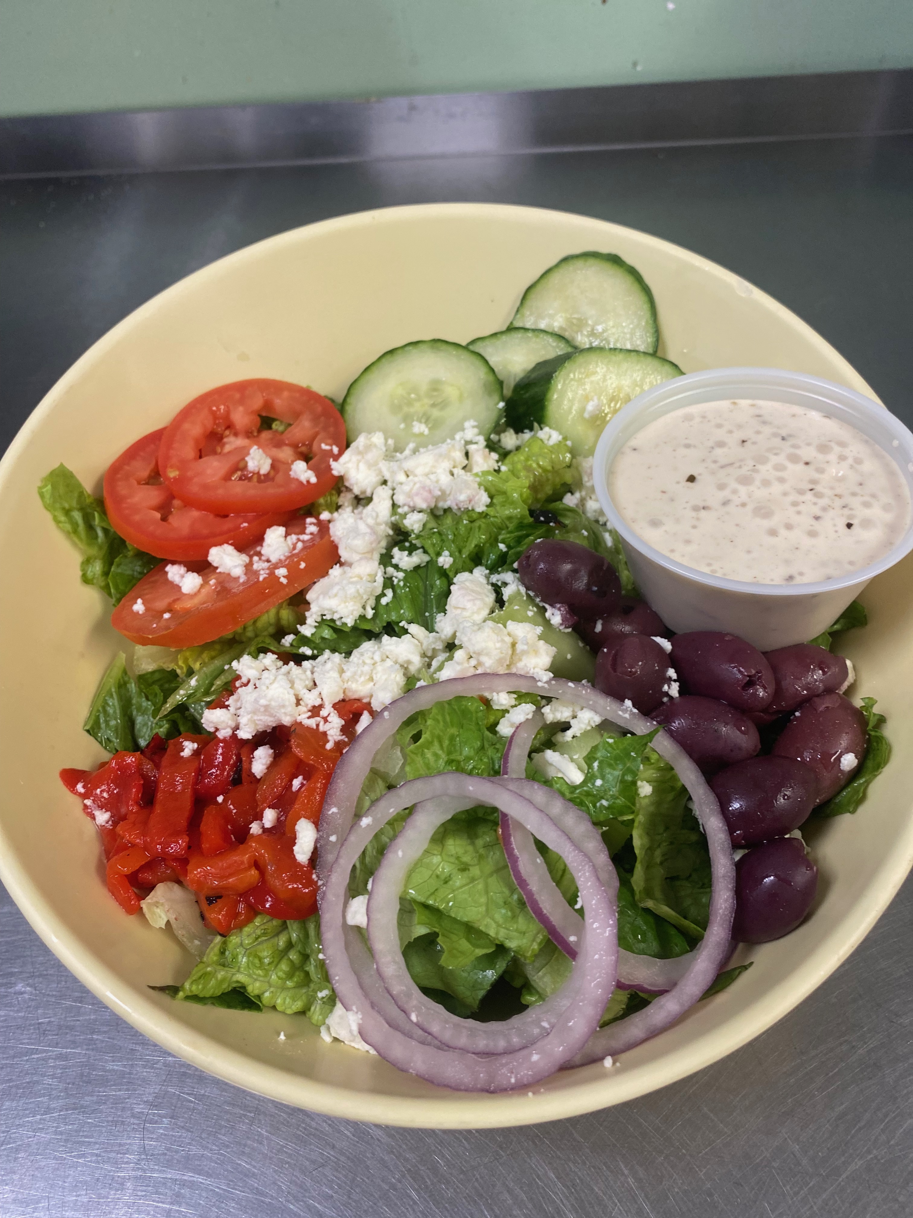 Order Greek Salad food online from Pepper Jack's Sandwich CRTN store, Albany on bringmethat.com