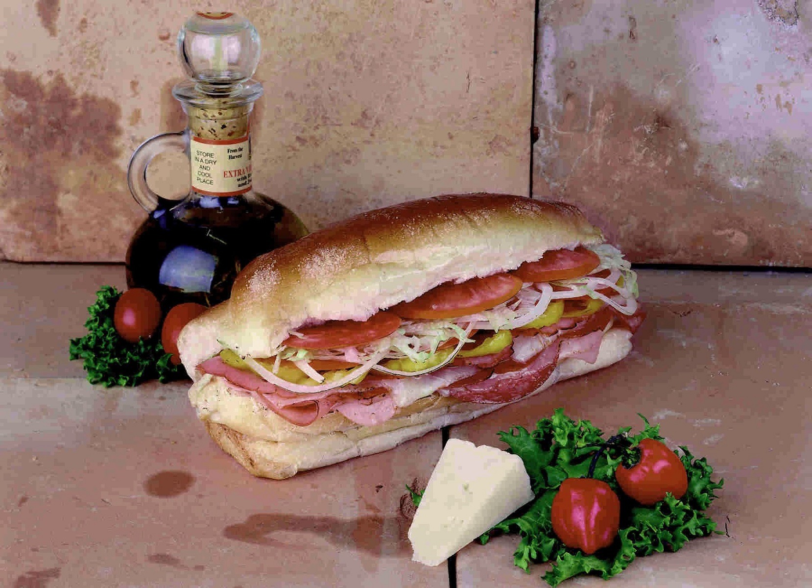 Order Italian Combo Sub food online from Big Apple Pizza store, Port Saint Lucie on bringmethat.com