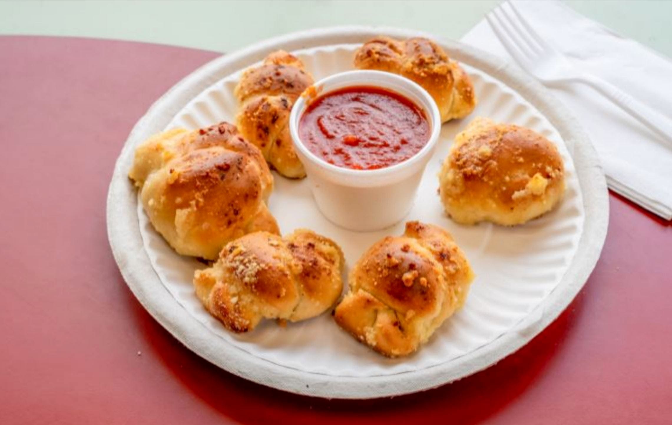 Order Garlic Knotts - 6 Pieces food online from Singas Pizza store, Hicksville on bringmethat.com