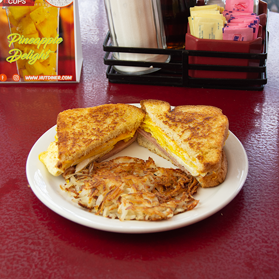 Order Big Texas Breakfast Sandwich food online from The Hut Diner store, San Antonio on bringmethat.com