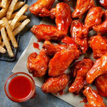 Order 16 Bone-In Wings food online from Conviction Chicken and Wings store, West Covina on bringmethat.com