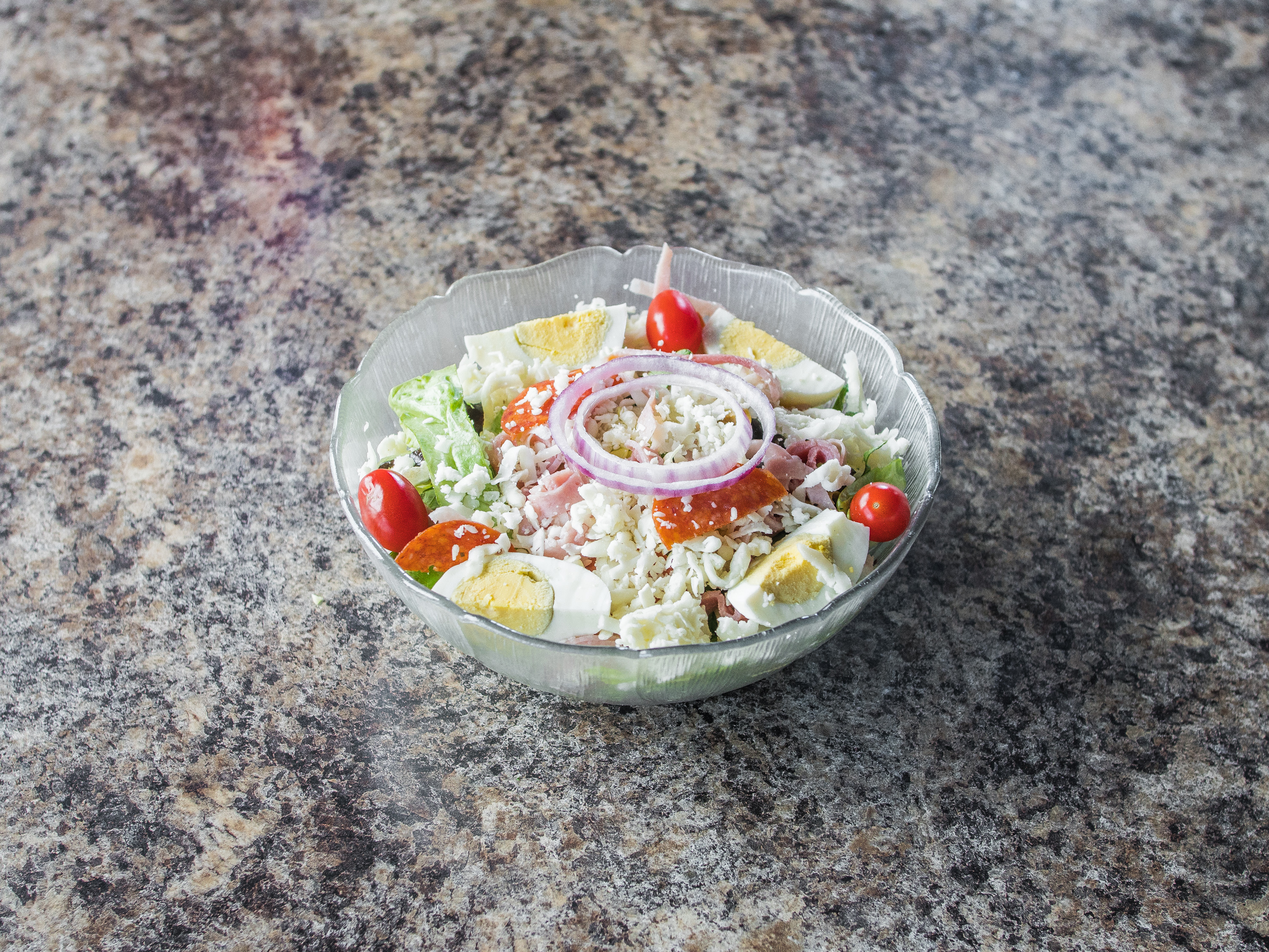 Order Greek Salad food online from Giuseppe's Pizza and Italian Specialities store, Augusta on bringmethat.com