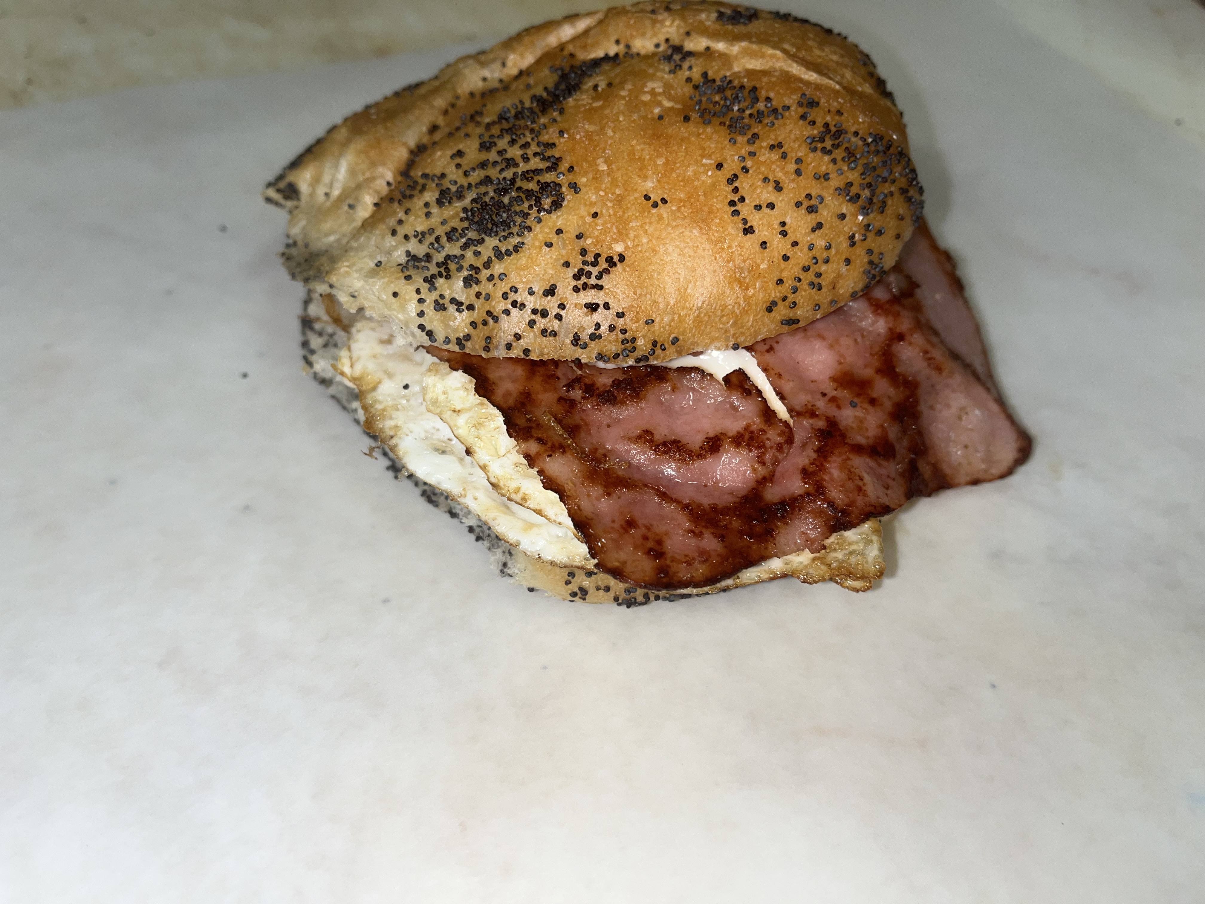 Order 2 Eggs with Ham on a Roll food online from Bagels N Brunch Deli store, Islip Terrace on bringmethat.com