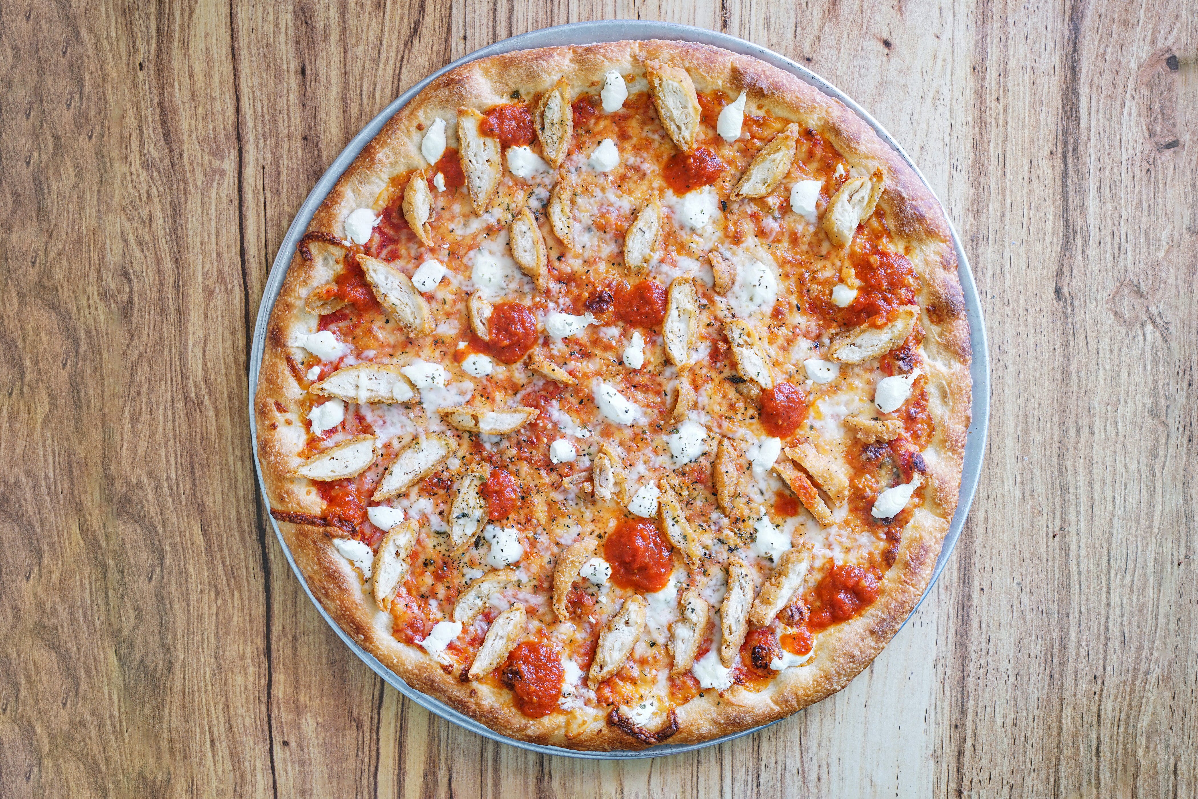 Order Chicken Parmigiana Pizza - Personal 10'' food online from Georgie Porgie Pudding & Pies store, Allentown on bringmethat.com