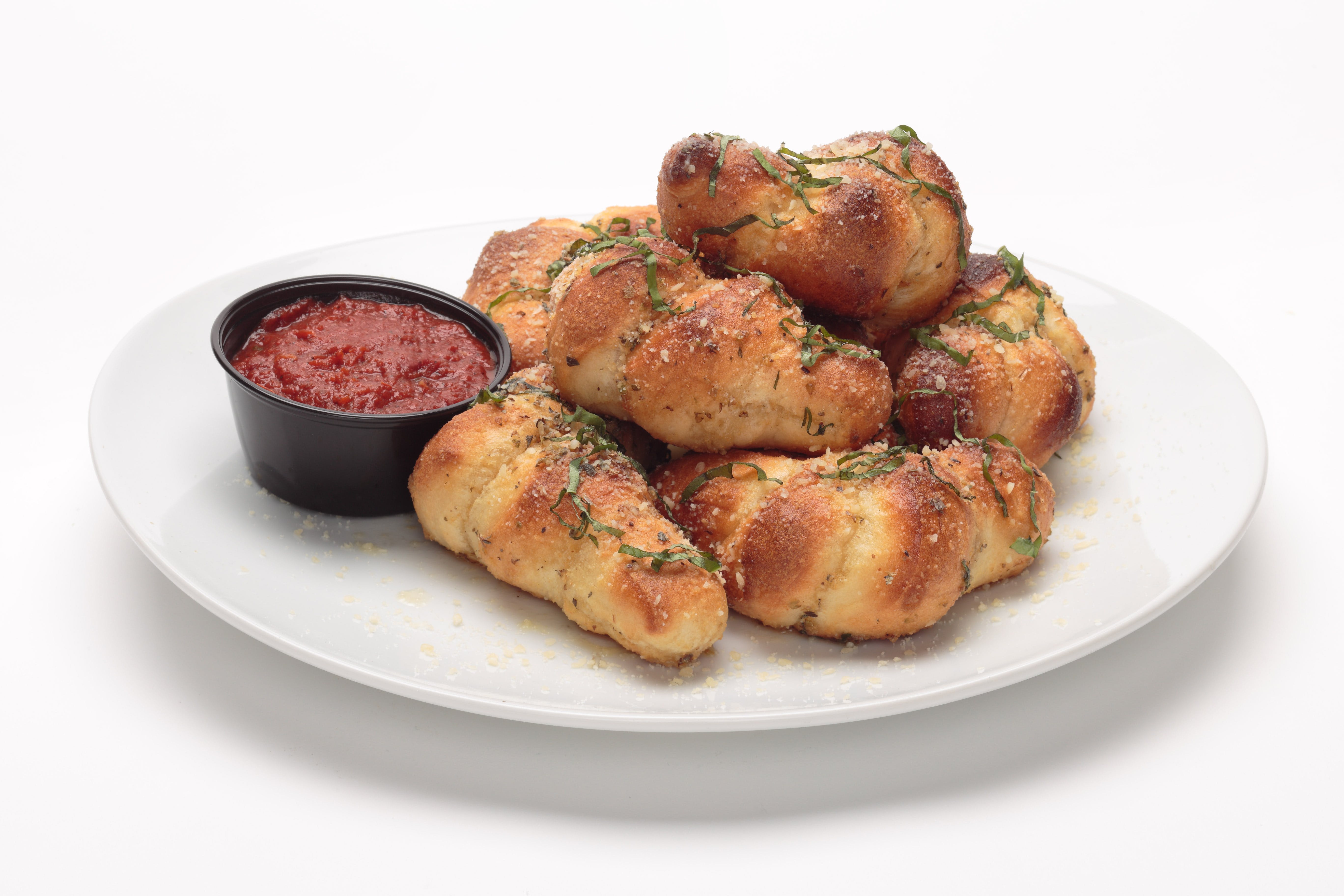 Order Garlic Knots - Half (4 Pieces) food online from Oggi Sports | Brewhouse | Pizza store, Garden Grove on bringmethat.com