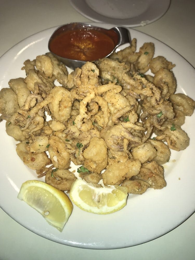 Order Fried Calamari - Appetizer food online from Valentino's store, Fresh Meadows on bringmethat.com