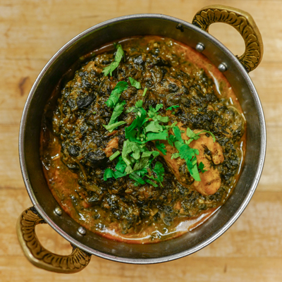 Order Saag Chicken food online from Annapurna Cafe store, Seattle on bringmethat.com