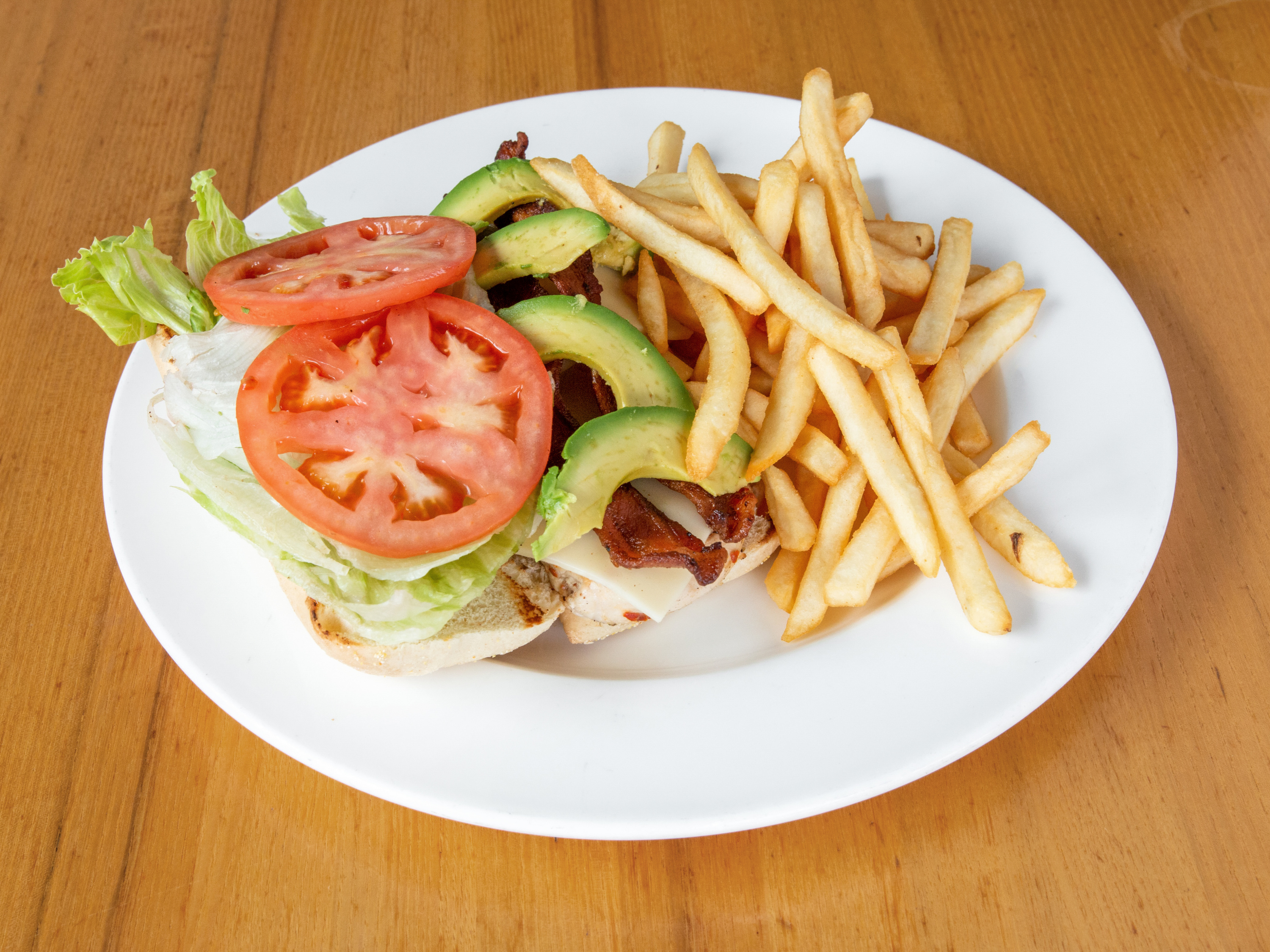Order Chicken Avocado BLT Sandwich food online from Between The Buns store, Arlington Heights on bringmethat.com