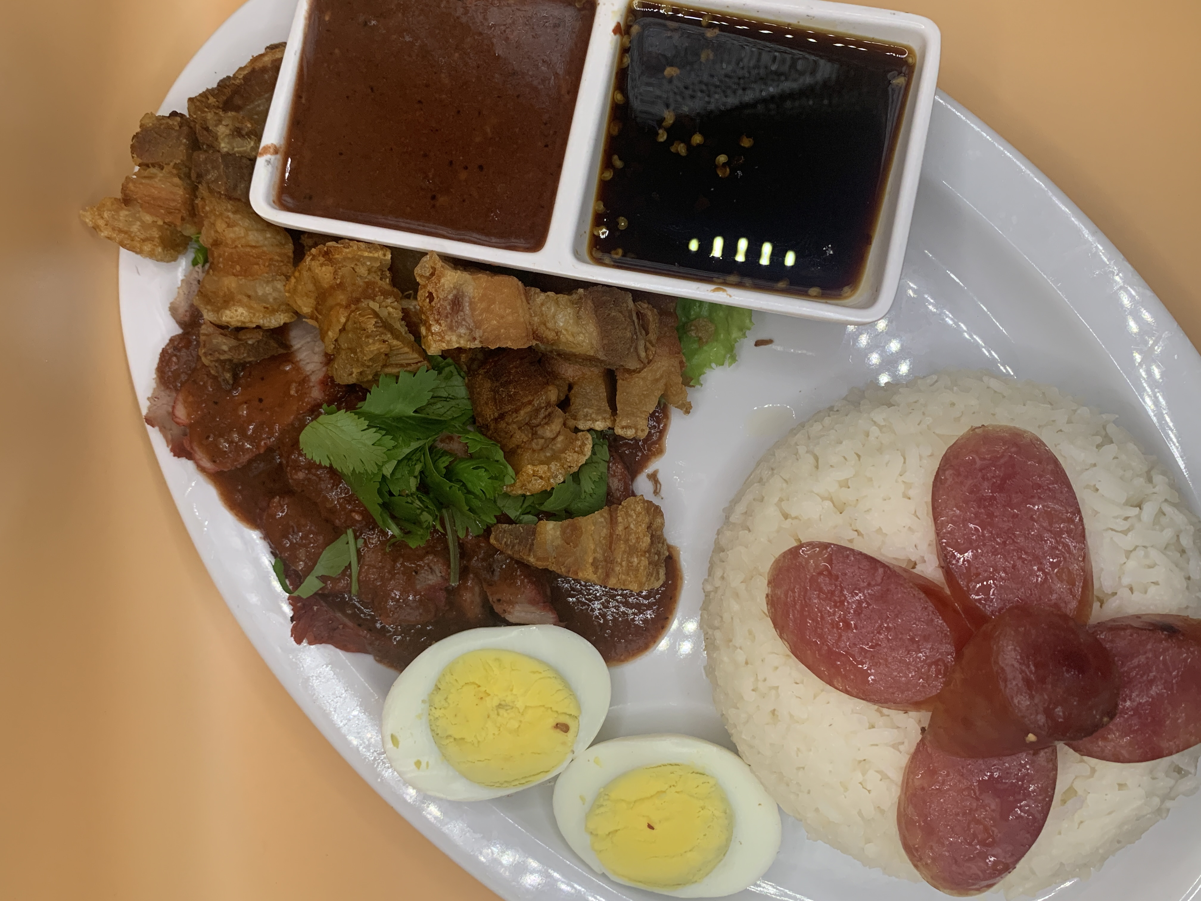 Order Khao Moo Krob + MooDang (Red BBQ Pork + Crispy Pork over rice) ข้าวหมูแดงกับหมูกรอบ food online from Khaokang Thai Kitchen store, Mountain View on bringmethat.com