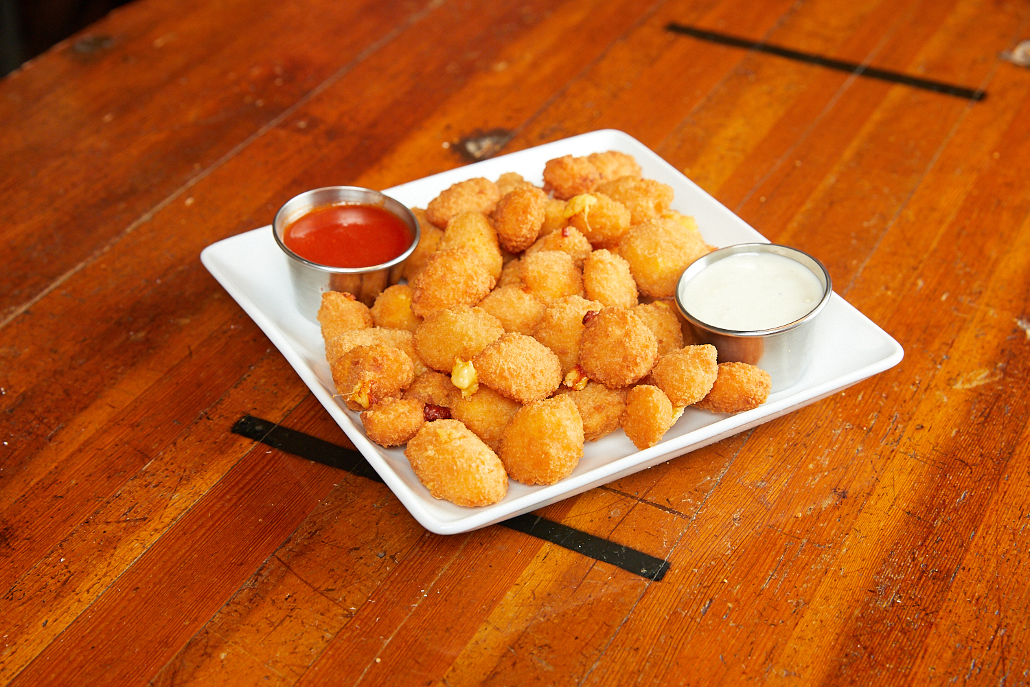 Order Badger-Style Fried Cheese Balls food online from Bartoli's Pizza store, Chicago on bringmethat.com
