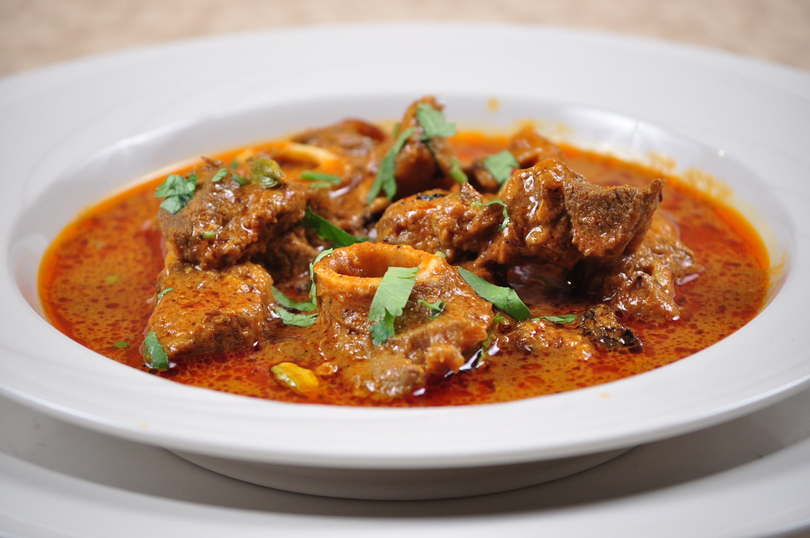 Order Lamb Curry food online from Naan N Curry store, Concord on bringmethat.com