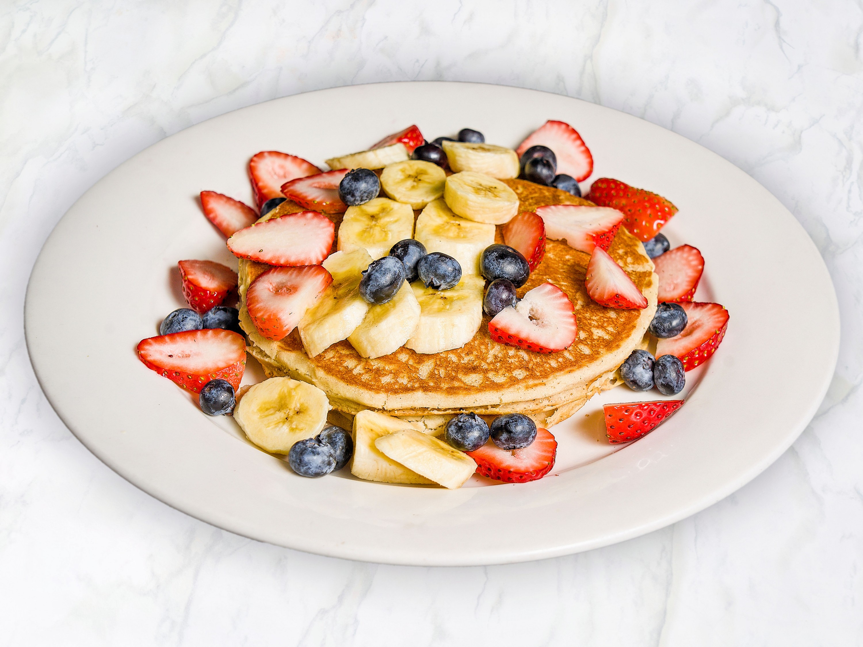 Order Gluten Free & Vegan Pancakes food online from Fuel Your Body Cafe store, Hicksville on bringmethat.com