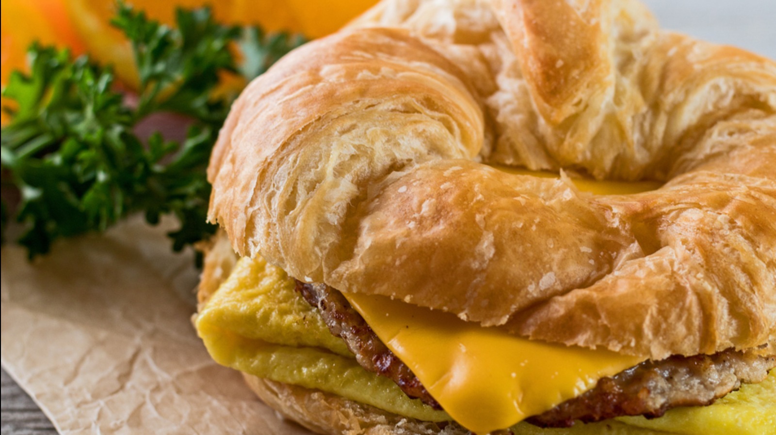 Order Sausage Egg and Cheese food online from Cafe Deli-Cious store, New York on bringmethat.com
