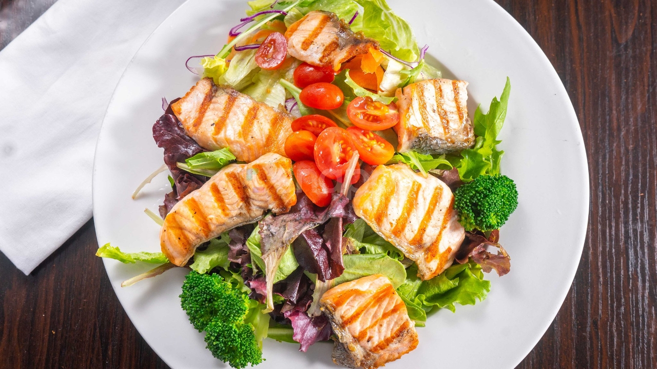 Order Grilled Salmon Salad food online from Sushi Plus store, Redwood City on bringmethat.com