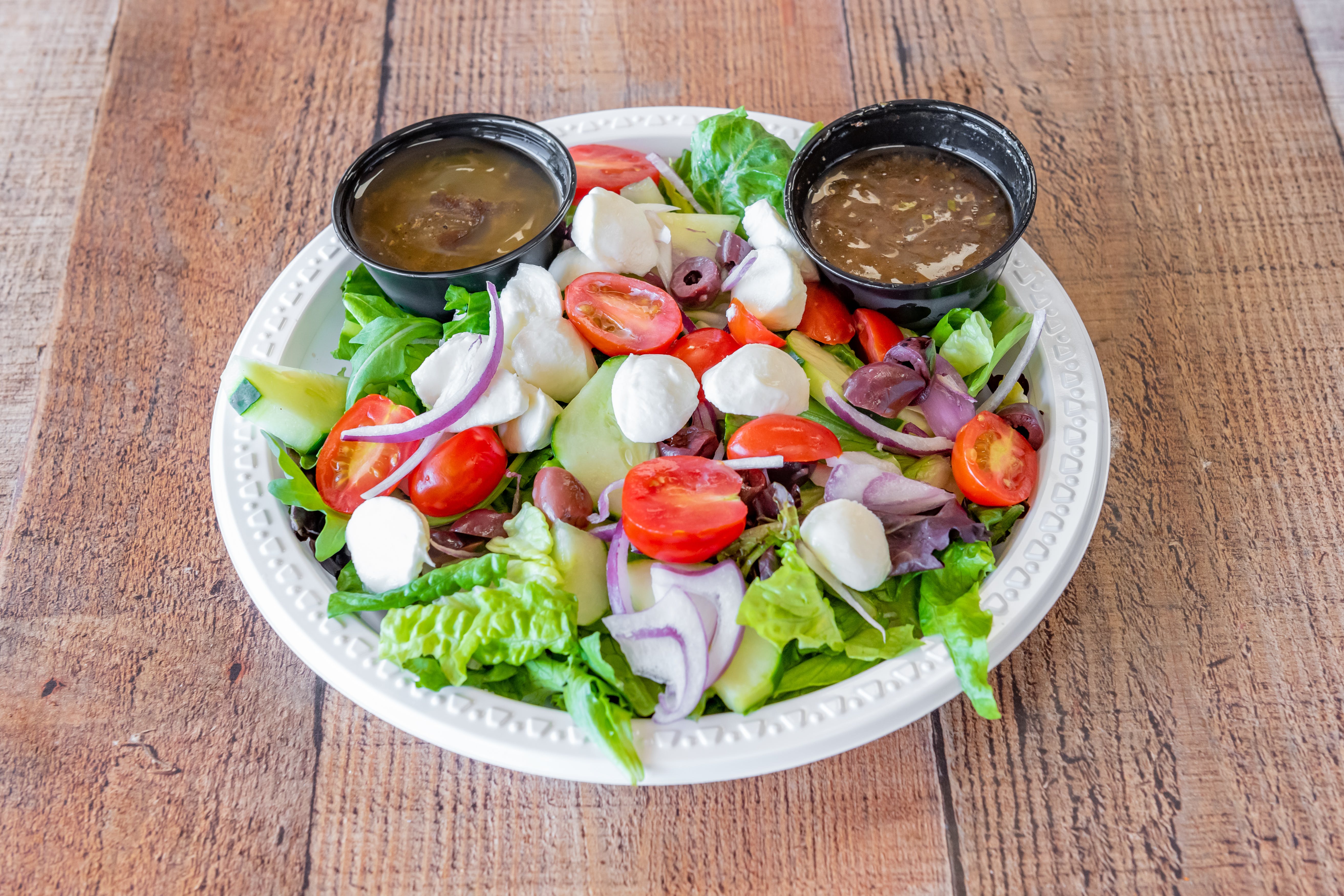 Order Garden Salad - Salad food online from Tonys Pizzeria & Italian Restaurant store, Audubon on bringmethat.com
