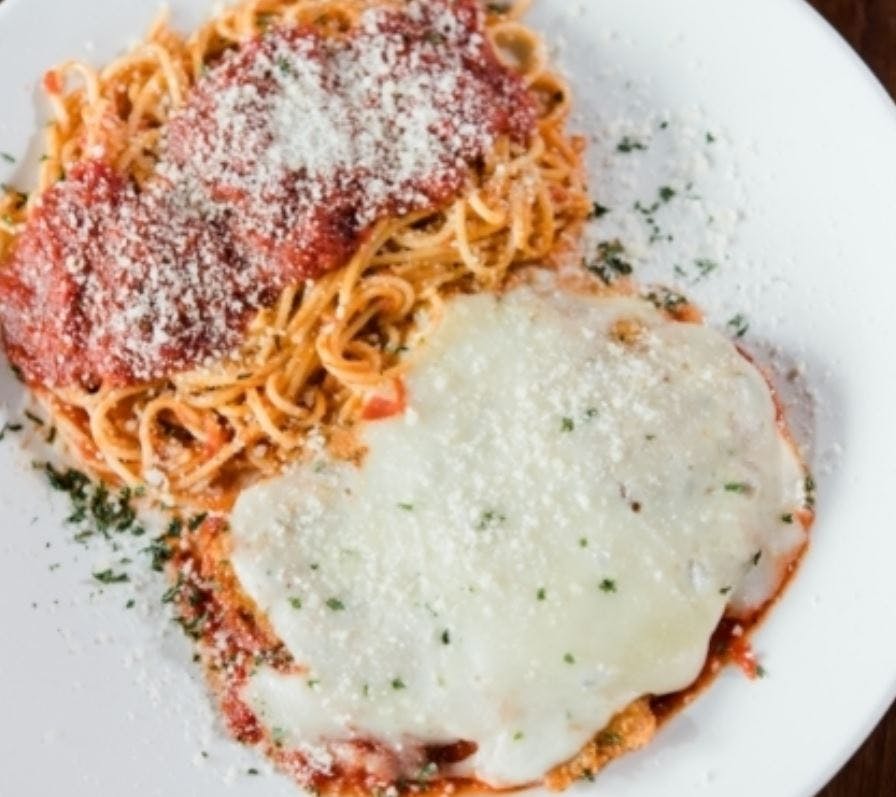 Order Chicken Parmesan with Spaghetti - Pasta food online from Jonny Pizza store, Fort Worth on bringmethat.com