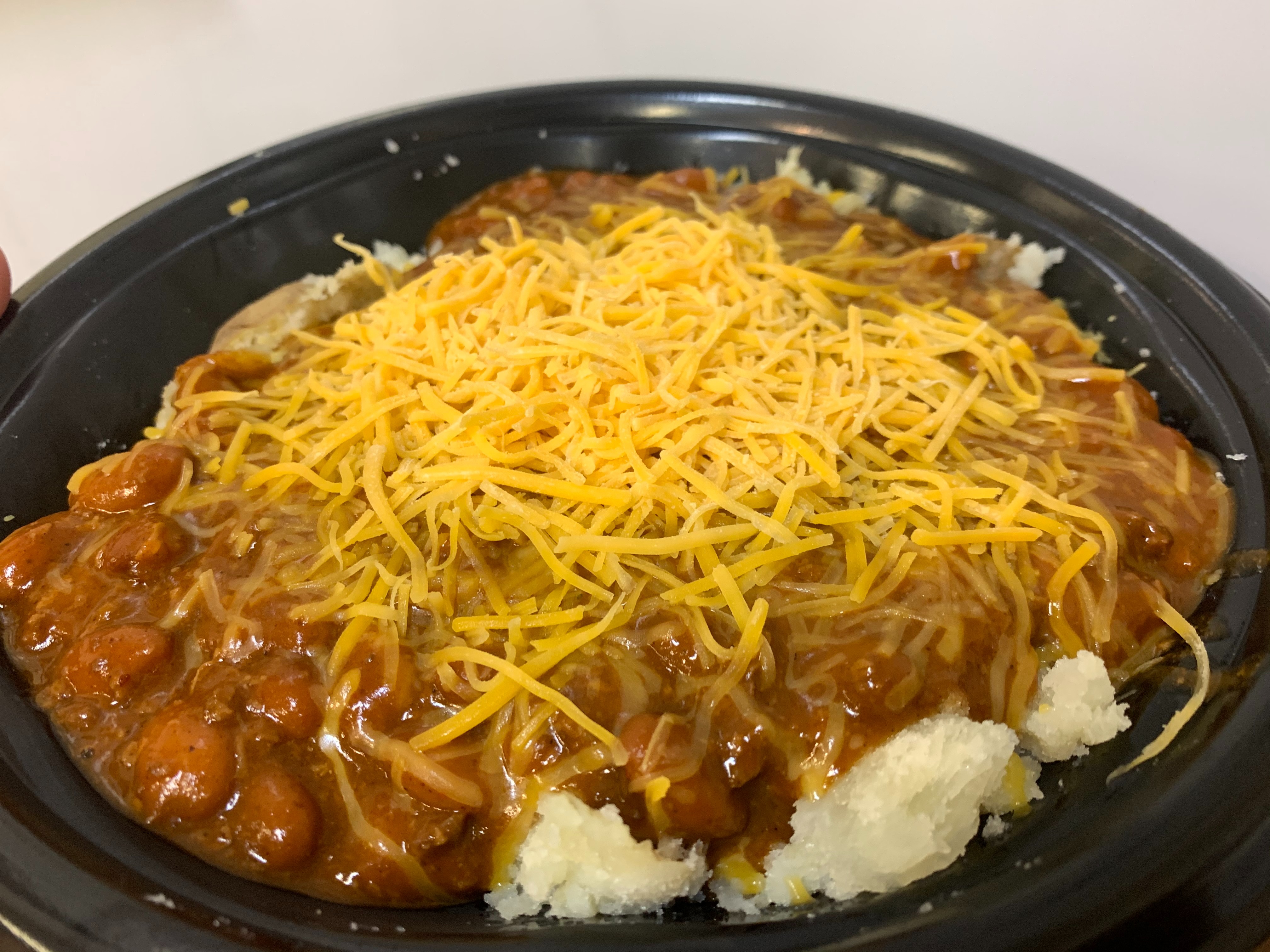 Order 30. Chili, Chopped Cheddar Potato food online from Lieber Boxcar Express store, Galesburg on bringmethat.com