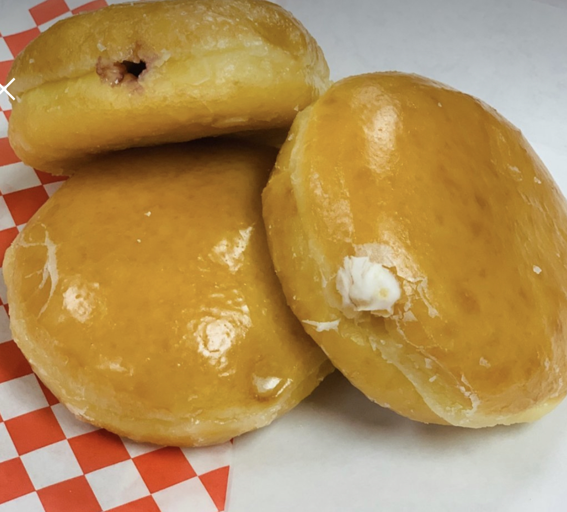 Order Raspberry Filled Donut food online from Bosa Donuts store, Surprise on bringmethat.com
