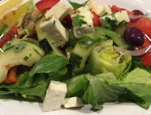 Order Greek Salad food online from Hummus Mediterranean Kitchen store, San Mateo on bringmethat.com