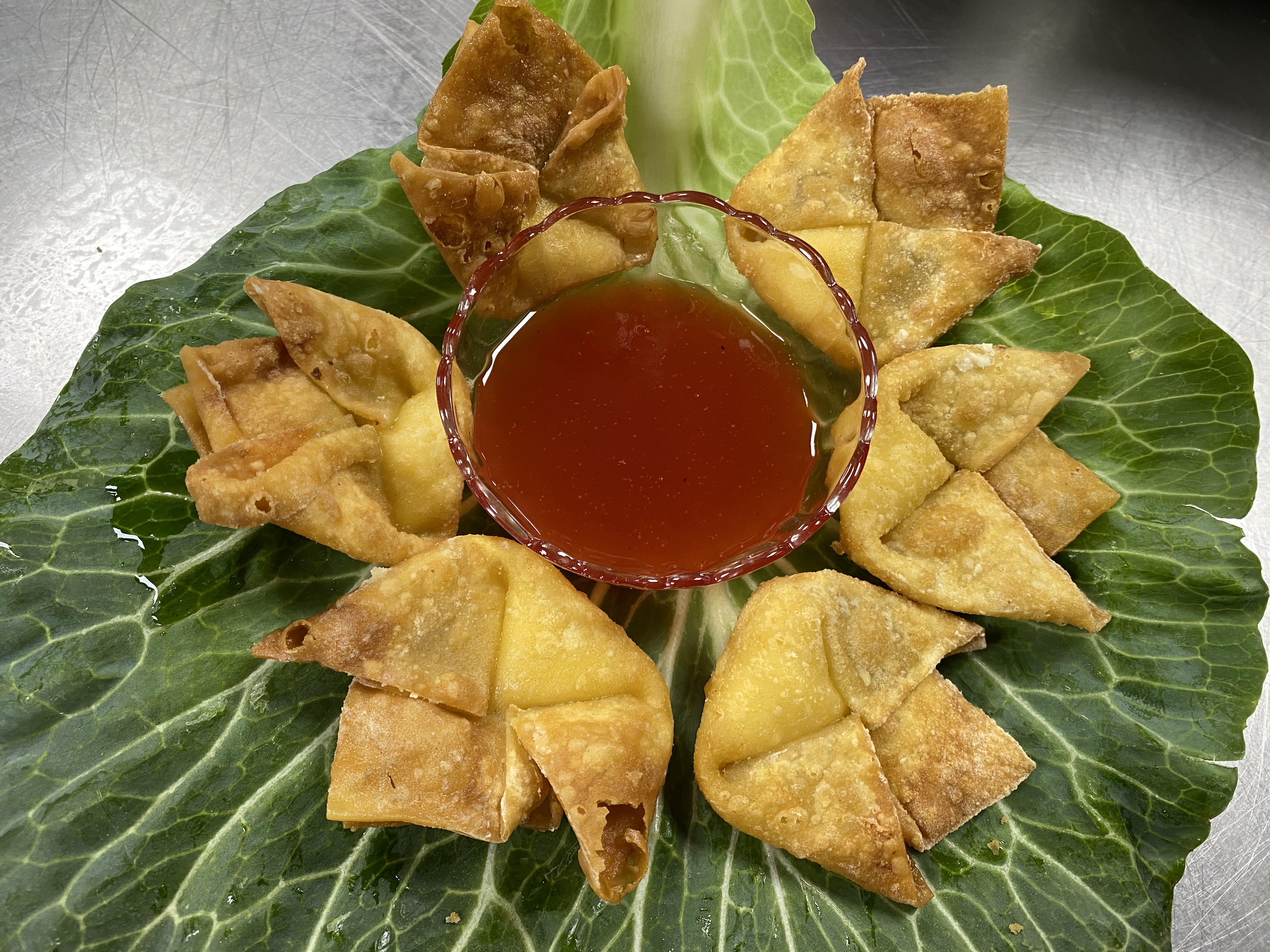 Order A7. Crab Rangoon (6) food online from Captain King Seafood City store, Memphis on bringmethat.com