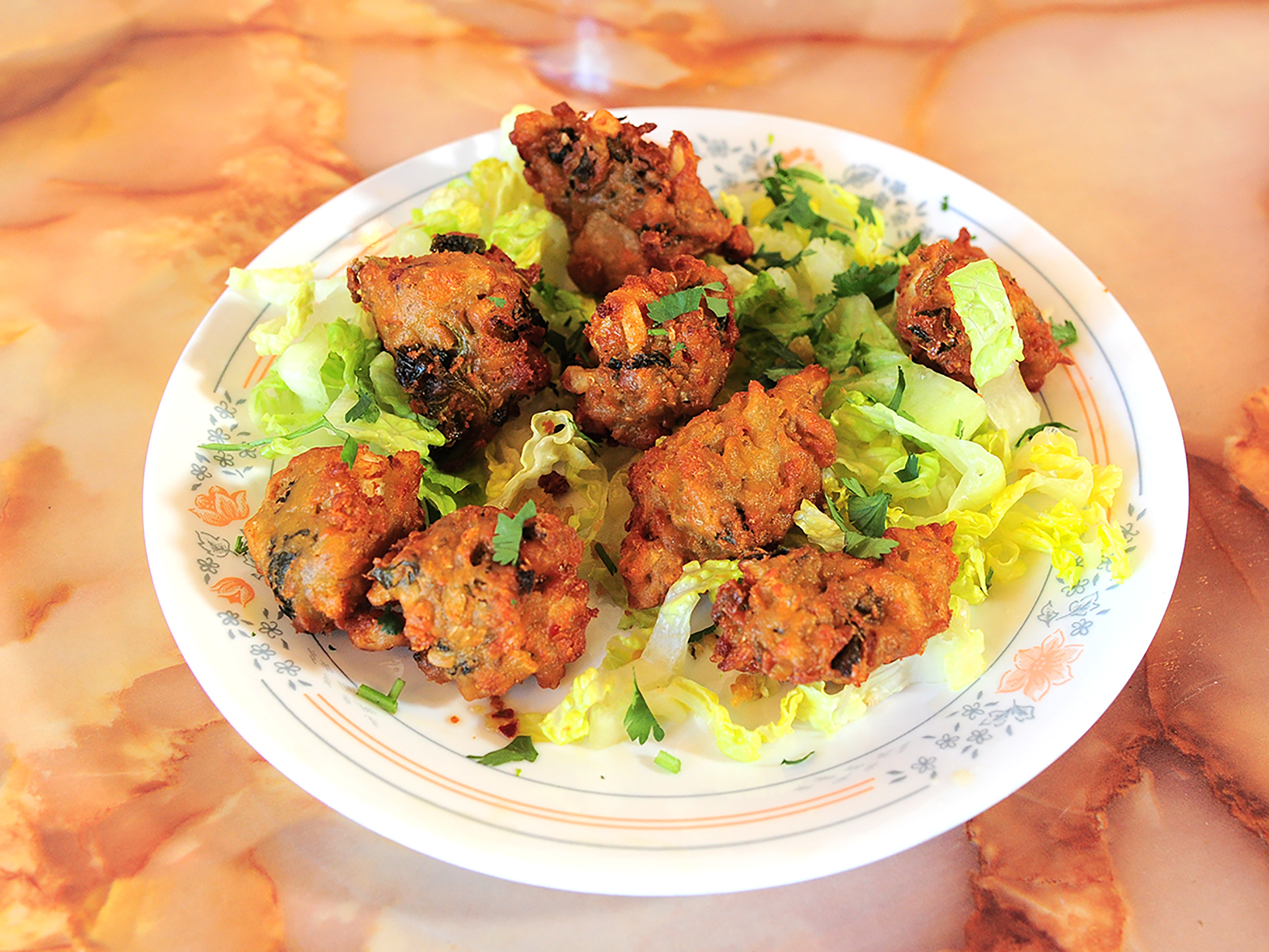 Order 2. Vegetable Pakora food online from Haveli Indian Cuisine store, Rochester on bringmethat.com