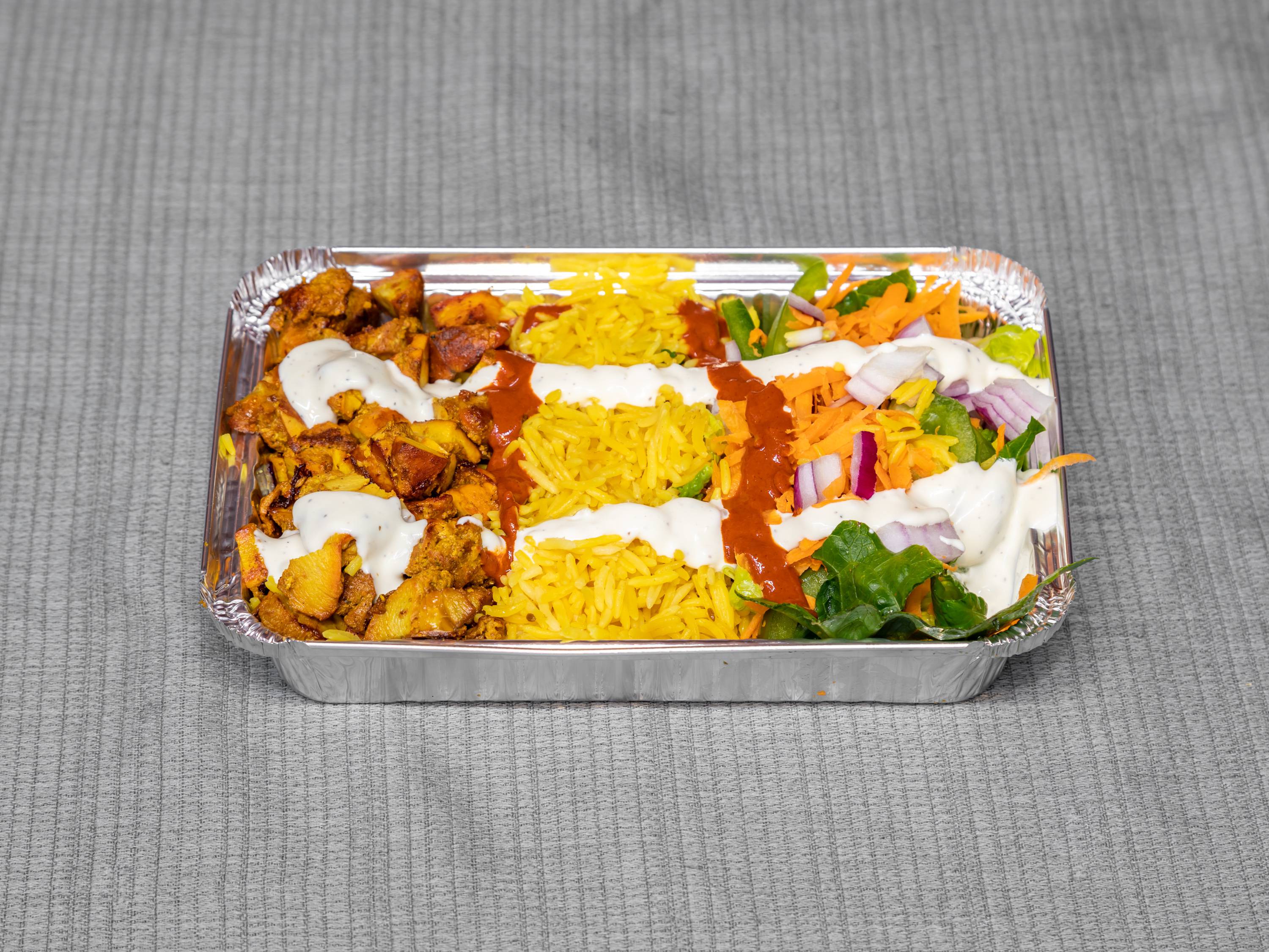 Order Chicken over rice food online from Murray Hills Gourmet Deli store, New York on bringmethat.com