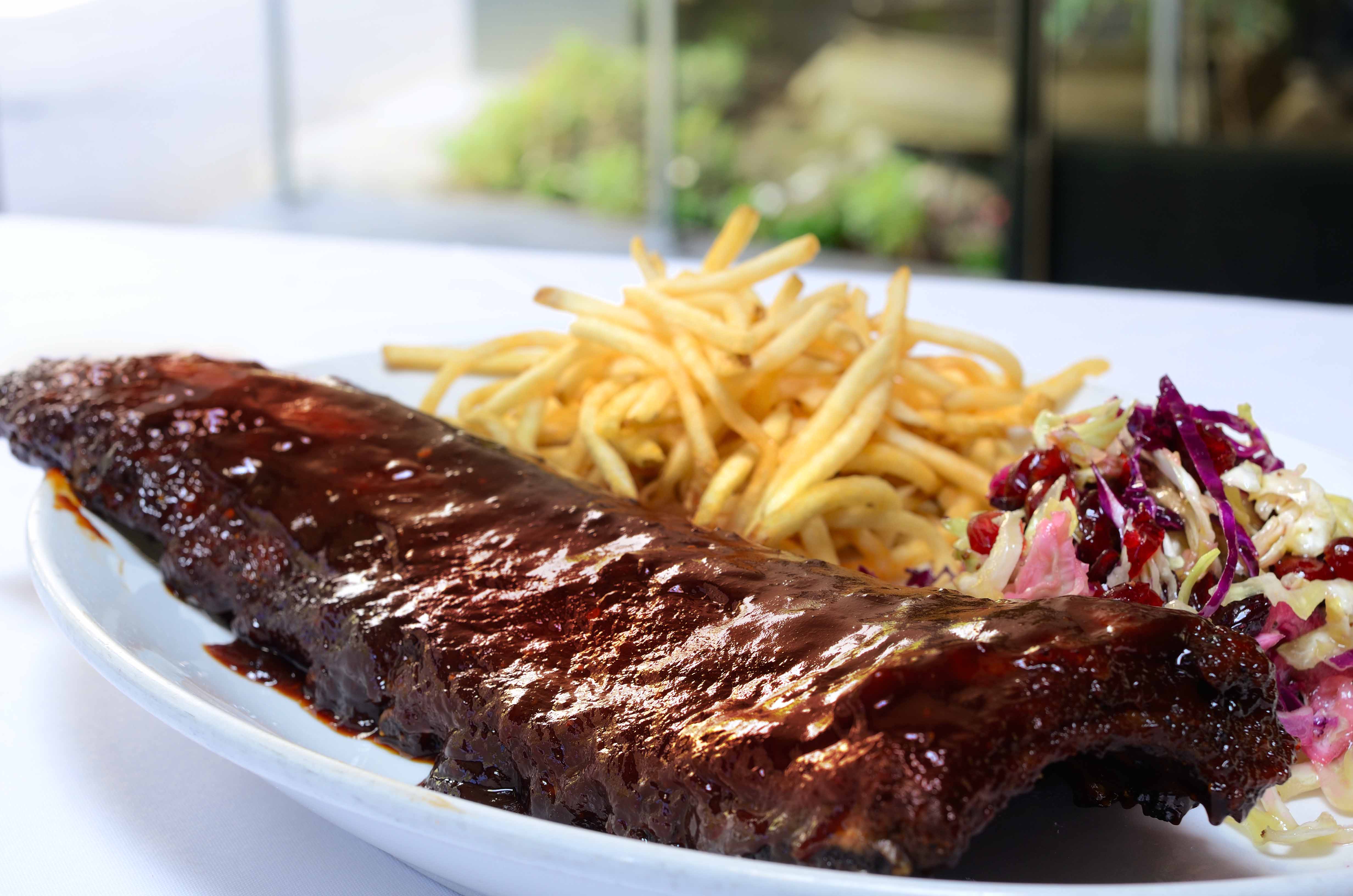 Order Rattlesnake BBQ Baby Back Ribs - Half Slab food online from Smitty Grill store, Pasadena on bringmethat.com