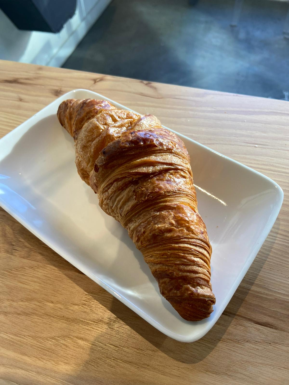 Order Butter Croissant food online from Sweet Science Coffee 2 store, Arlington on bringmethat.com