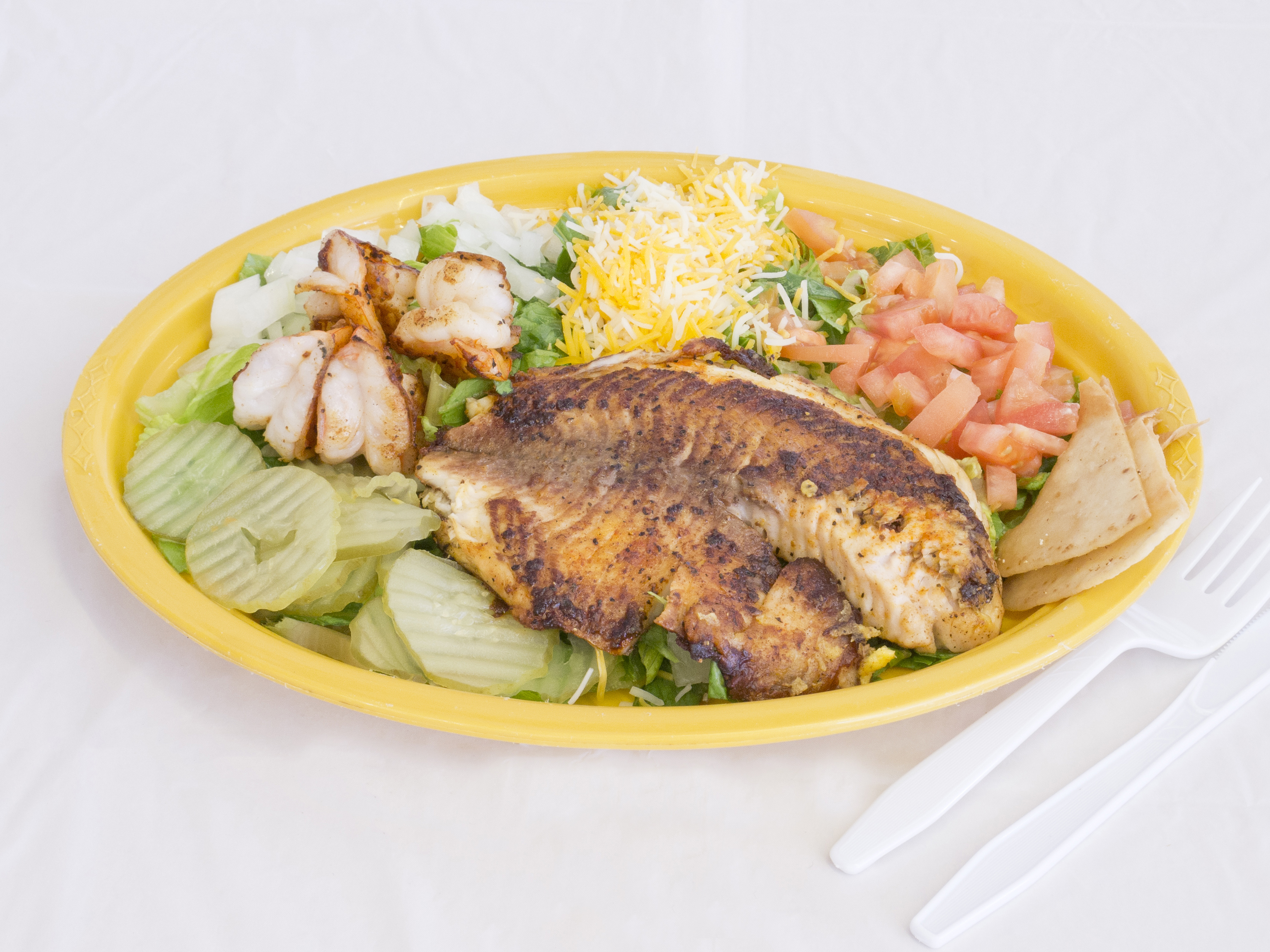 Order Grilled Tilapia Salad Special food online from Pt's Fried Chicken store, Dallas on bringmethat.com