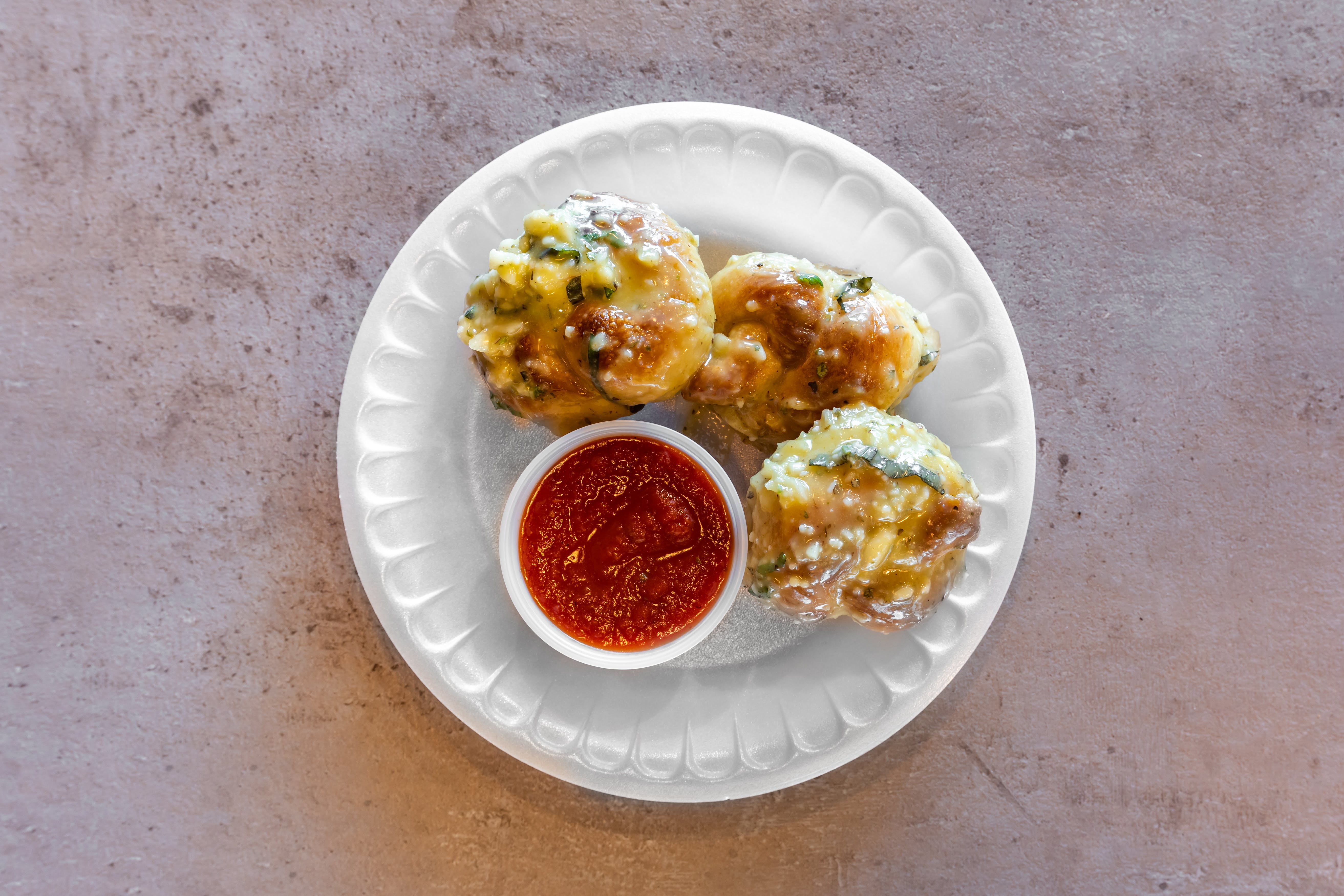Order Garlic Knots - 3 Pieces food online from Pizza & Panini store, Toms River on bringmethat.com