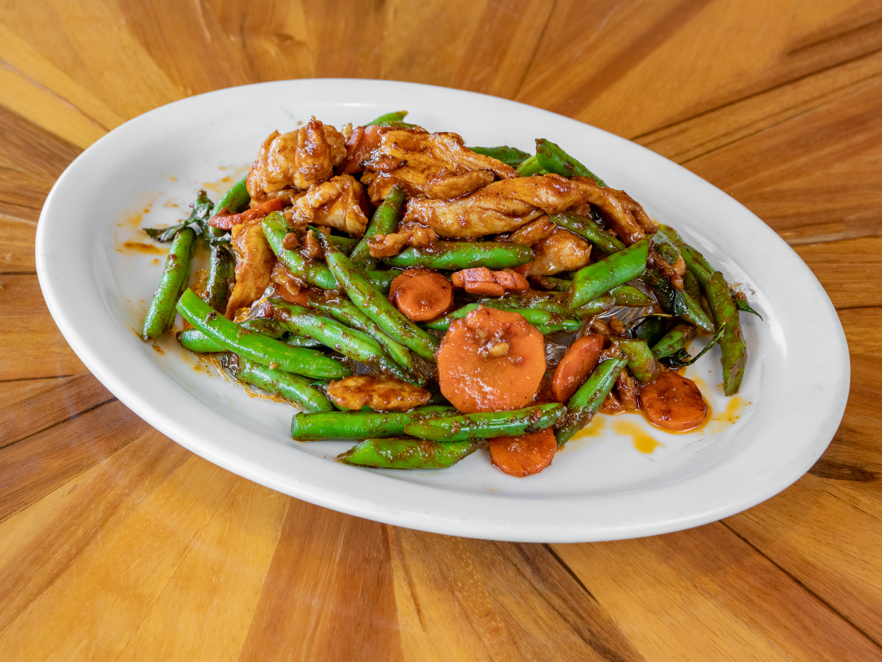 Order 26. Fried Green Beans in Red Chili Sauce food online from Peppers Thai store, Palm Springs on bringmethat.com