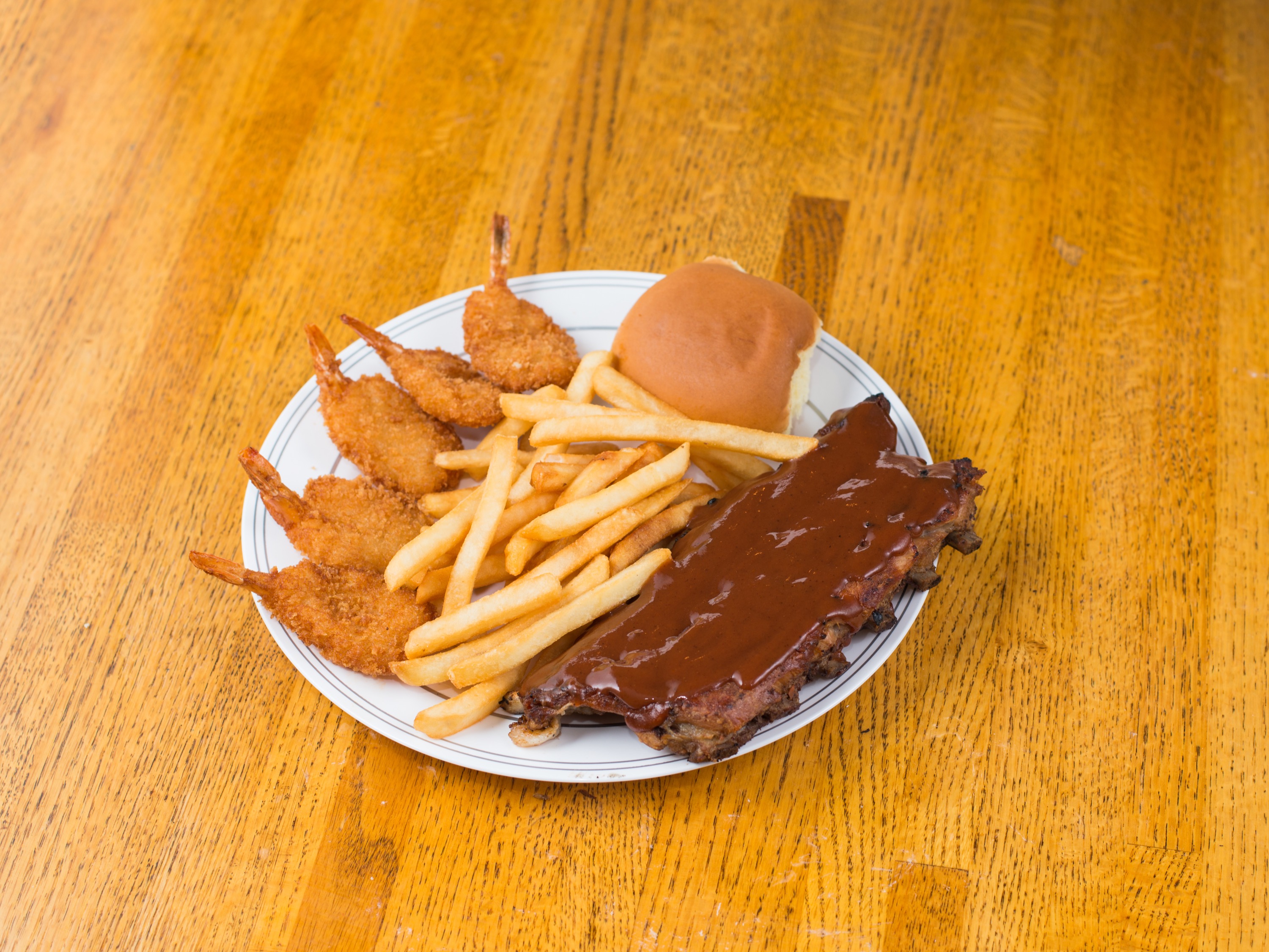 Order 1/2 Slab Ribs & 5 Shrimp BBQ Combo food online from Russell's Barbecue store, Elmwood Park on bringmethat.com