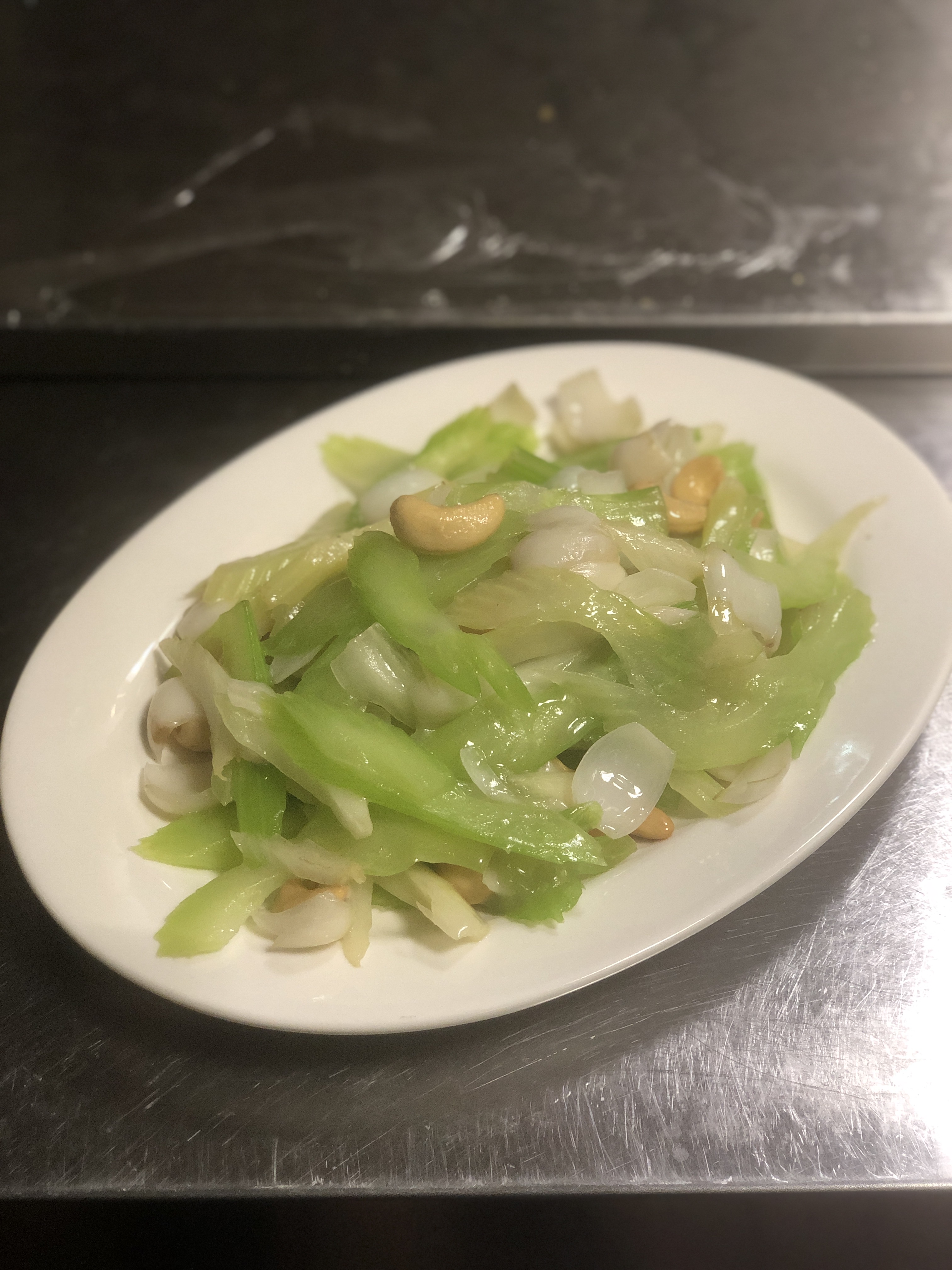 Order Stir-Fried Fresh Lily Bulb with Celery and Cashews food online from House Of Fortune Vegetarian store, Chino on bringmethat.com