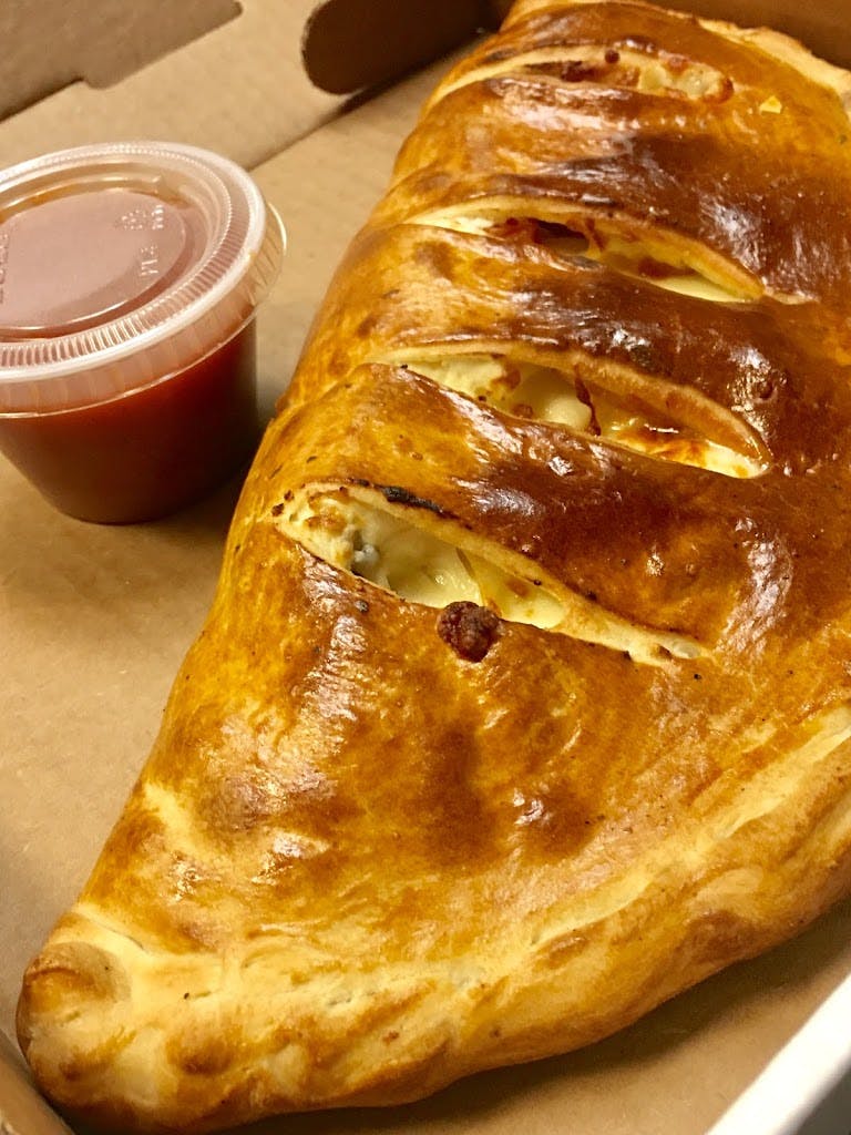Order Calzone - Calzone food online from Listrani's store, McLean on bringmethat.com