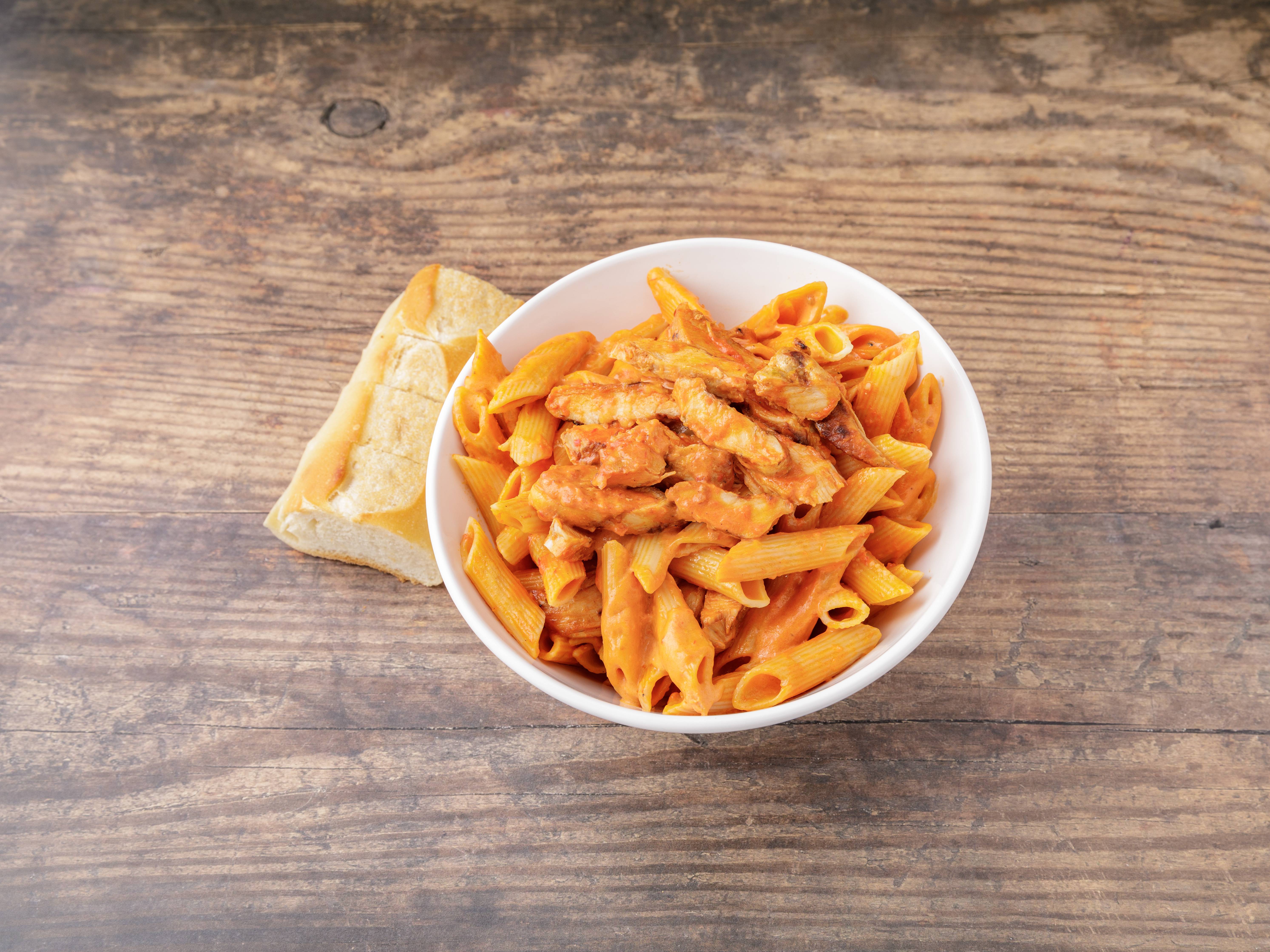 Order Penne Vodka with Chicken food online from Pizza & Sandwich Express store, Little Falls on bringmethat.com