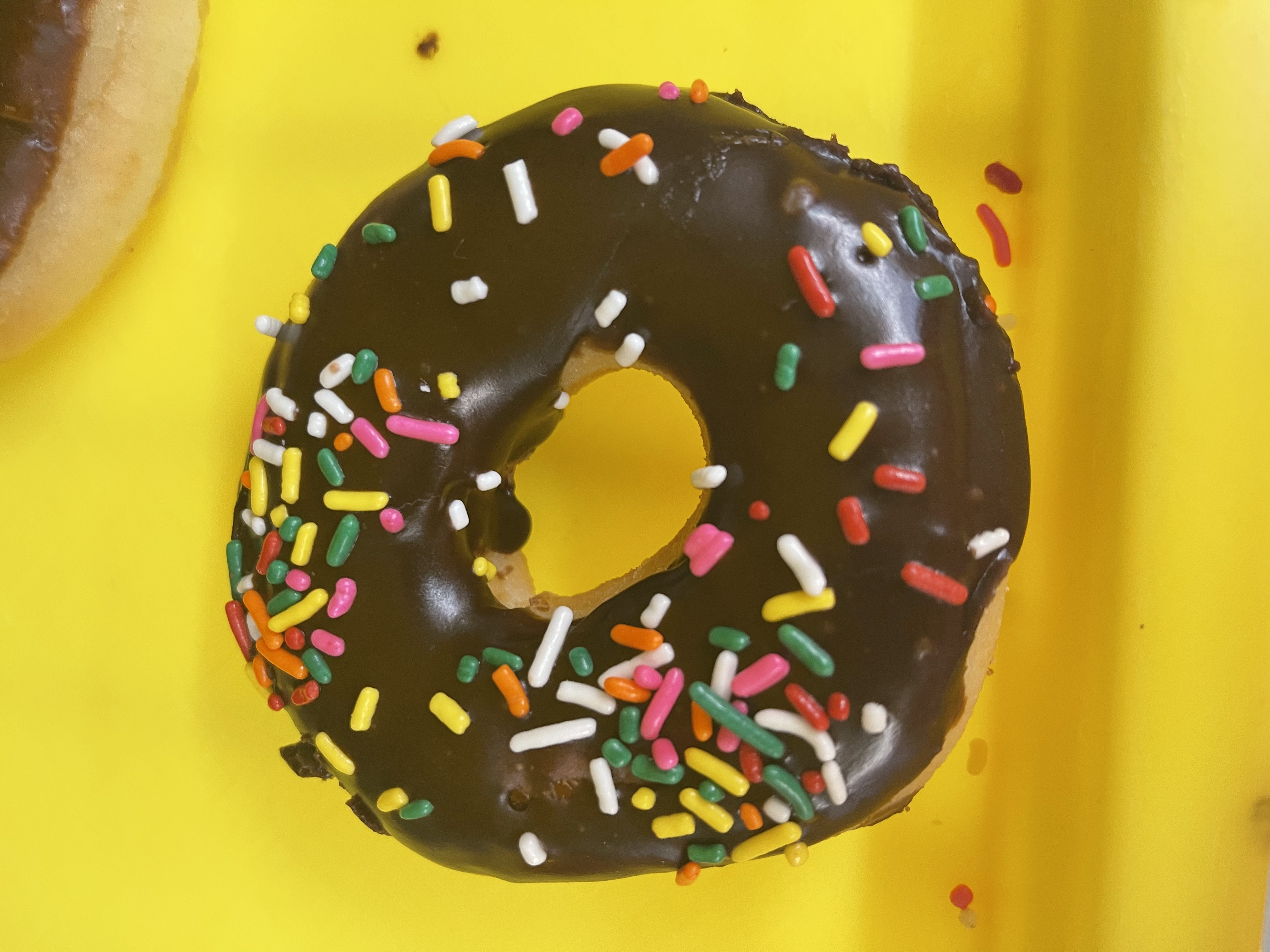 Order Chocolate Sprinkle Donut  food online from T-Town Daylight Donuts store, Tulsa on bringmethat.com