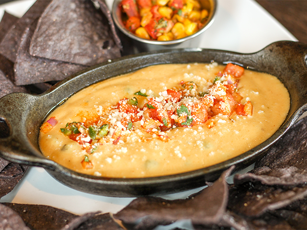 Order Roasted Pablano Queso Dip food online from Reds At Thousand Oaks store, Grand Rapids on bringmethat.com