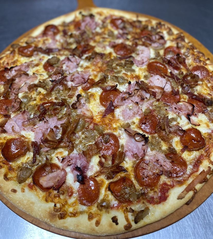 Order Meat Lovers Pizza food online from Magic Mike Pizza store, Westminster on bringmethat.com