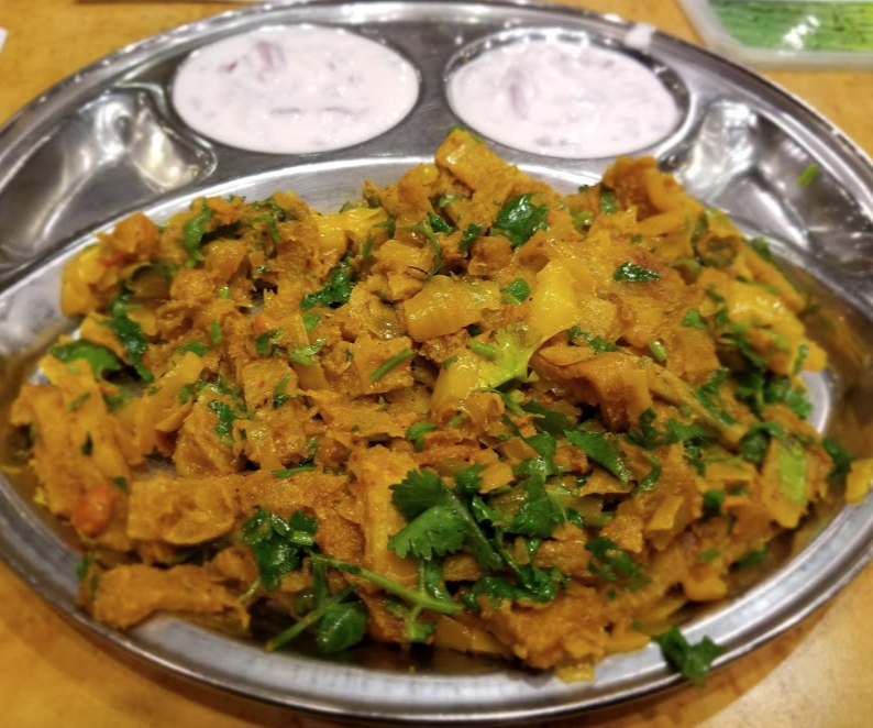 Order Mixed Vegetable Parotta food online from Saravanaa Bhavan store, Houston on bringmethat.com