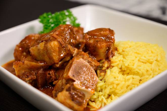 Order Oxtail food online from Who's Got Soul Southern Cafe store, Decatur on bringmethat.com