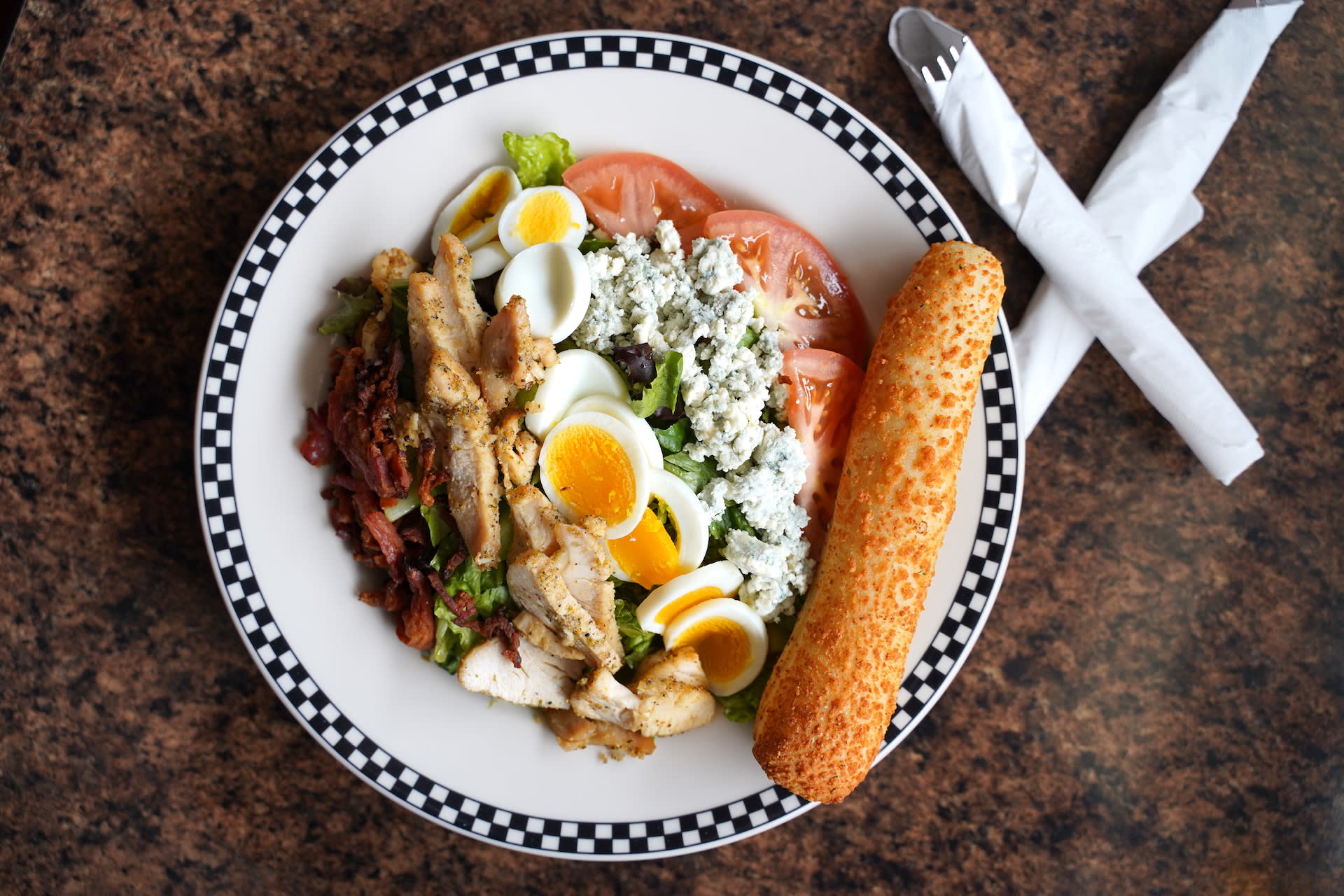 Order Cobb Salad food online from Panino's Downtown store, Colorado Springs on bringmethat.com