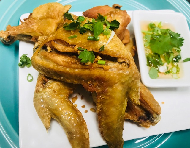 Order Lao Chicken Wing Pieces ( 5 pieces) food online from Pho Thai-Lao Kitchen store, Maywood on bringmethat.com