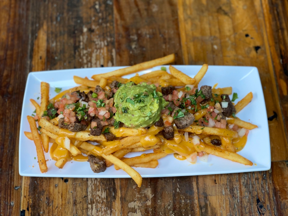 Order Asada Fries **Can Not Be Made Vegan** food online from Golden Road Brewing store, Sacramento on bringmethat.com