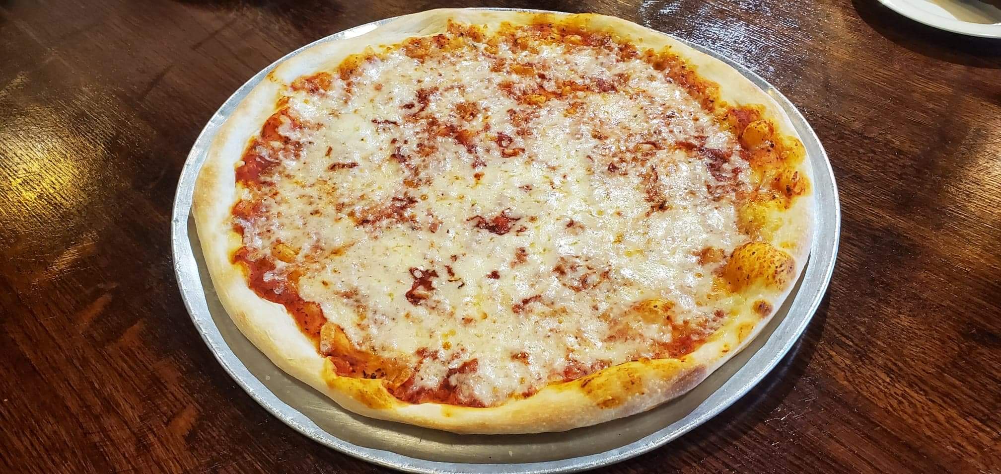 Order New York Style Cheese Pizza food online from Italiano store, Pearland on bringmethat.com
