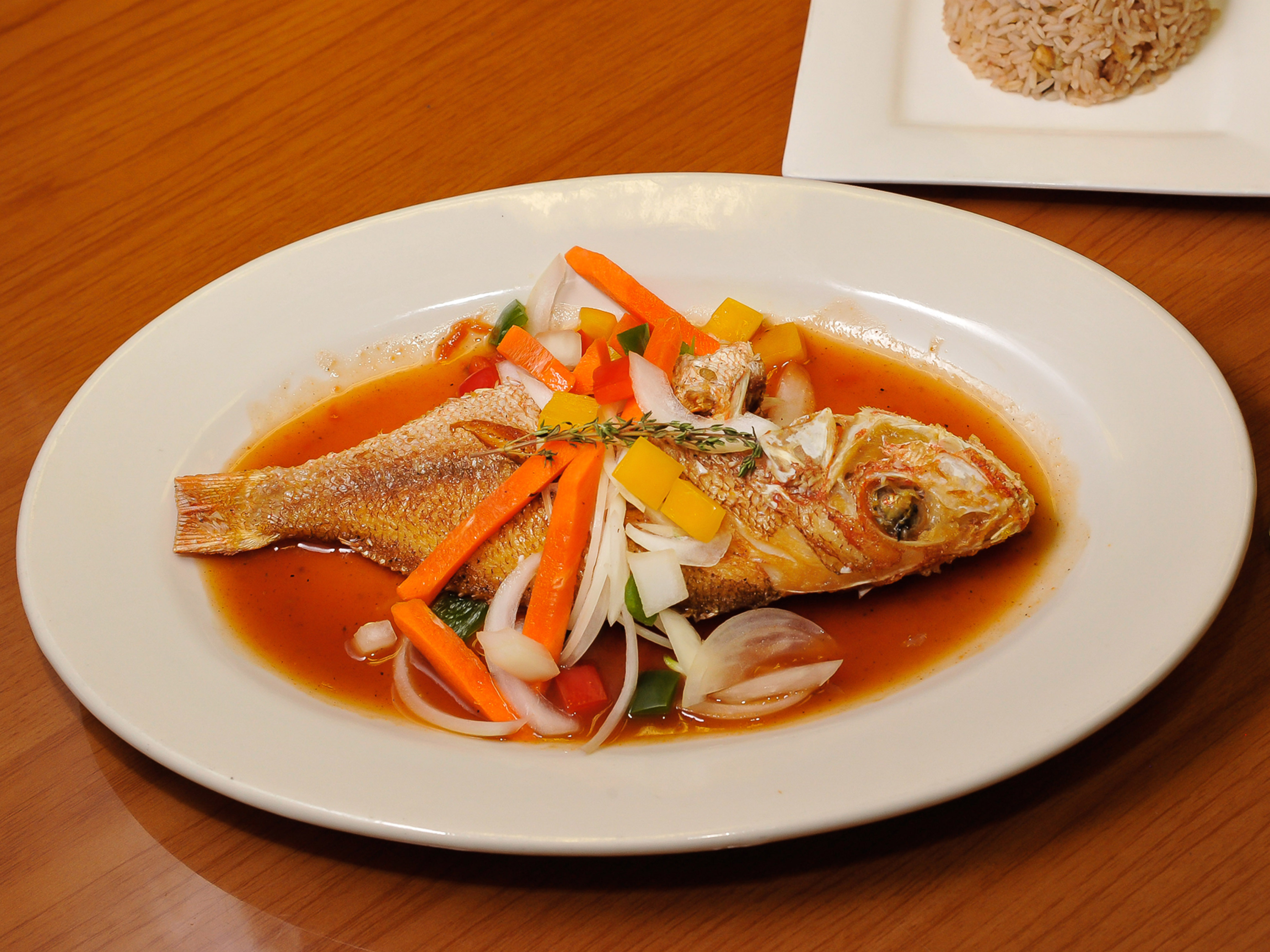 Order Steamed Red Snapper food online from Irie Mon Cafe store, Atlanta on bringmethat.com