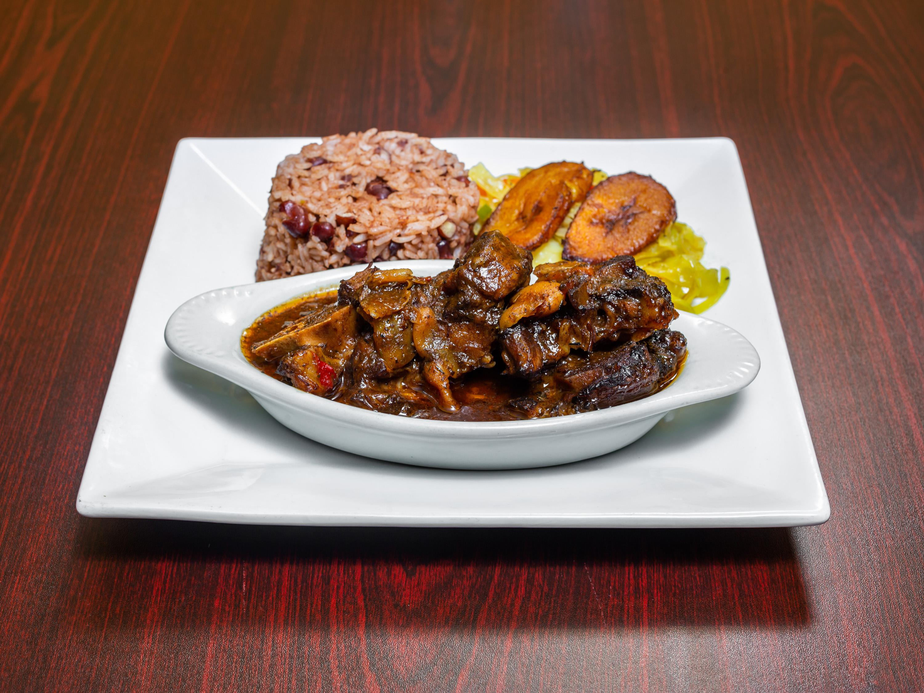 Order Oxtail food online from Malakhi Lounge & Jamaican Restaurant store, Manassas on bringmethat.com