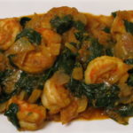 Order 84. Saag Shrimp food online from Taj Restaurant store, Warren on bringmethat.com